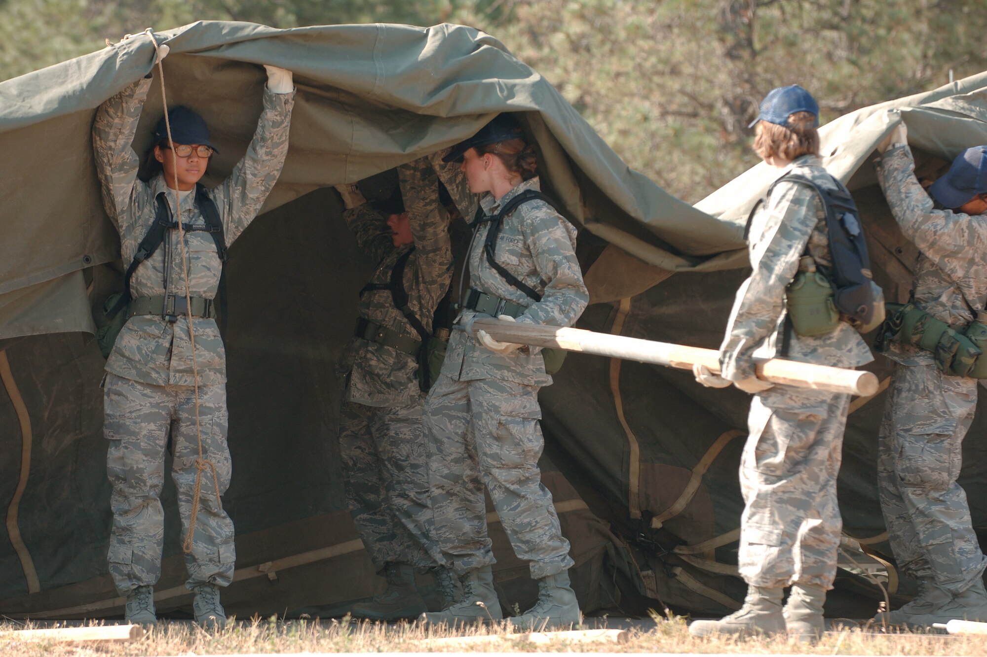 U.S. Air Force Academy basic cadets set up their tents July 14 at the Jacks Valley training area near Colorado Springs, Colo., as the field training portion of basic training begins.  (U.S. Air Force photo/David Armer)