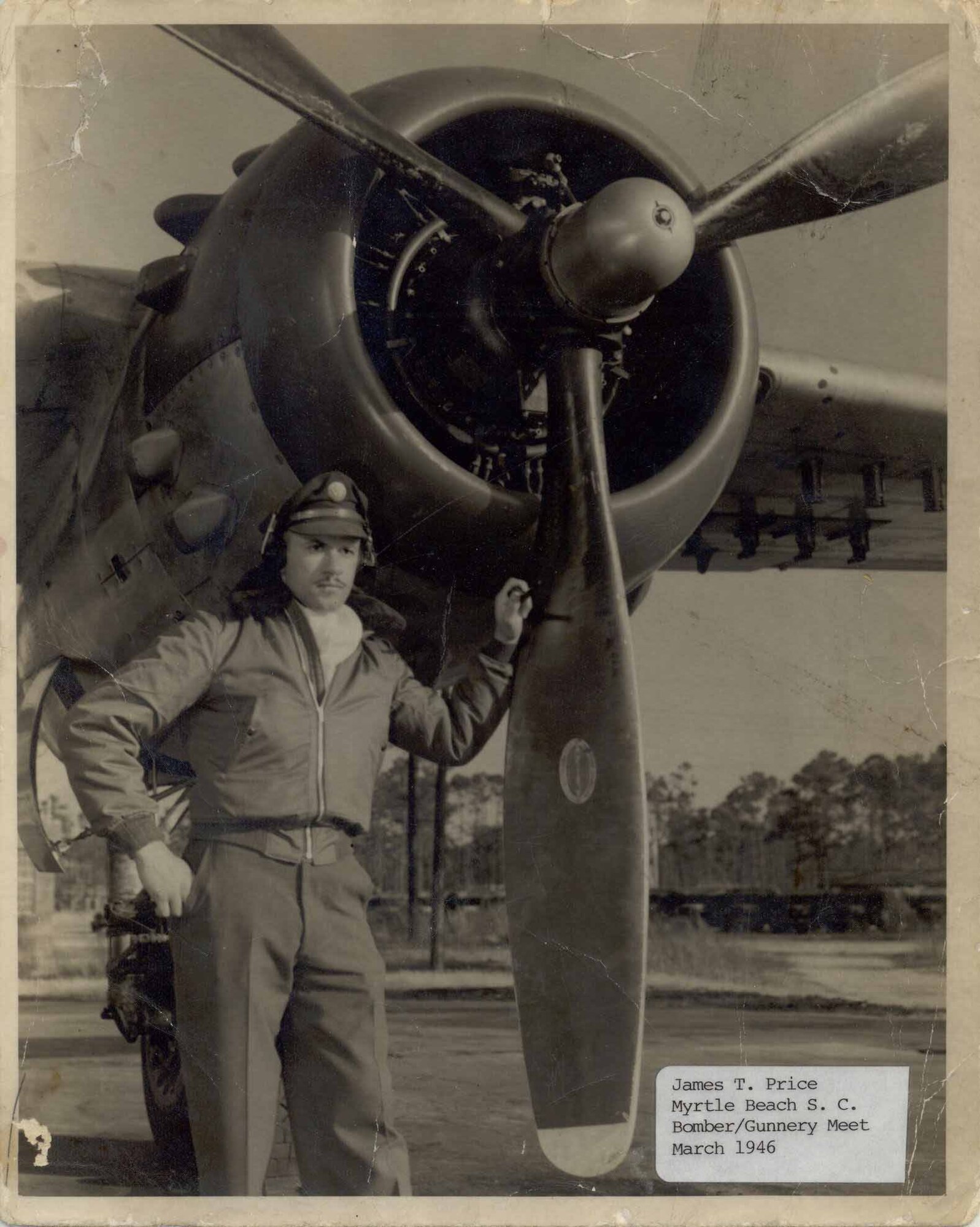 James Price, then a Tuskegee Airman, poses in front of a B-25 in 1946 at Myrtle Beach, N.C. Price served as an aerial gunman with the unit from 1945 to 1949, when the military was fully integrated. (Courtesy photo)