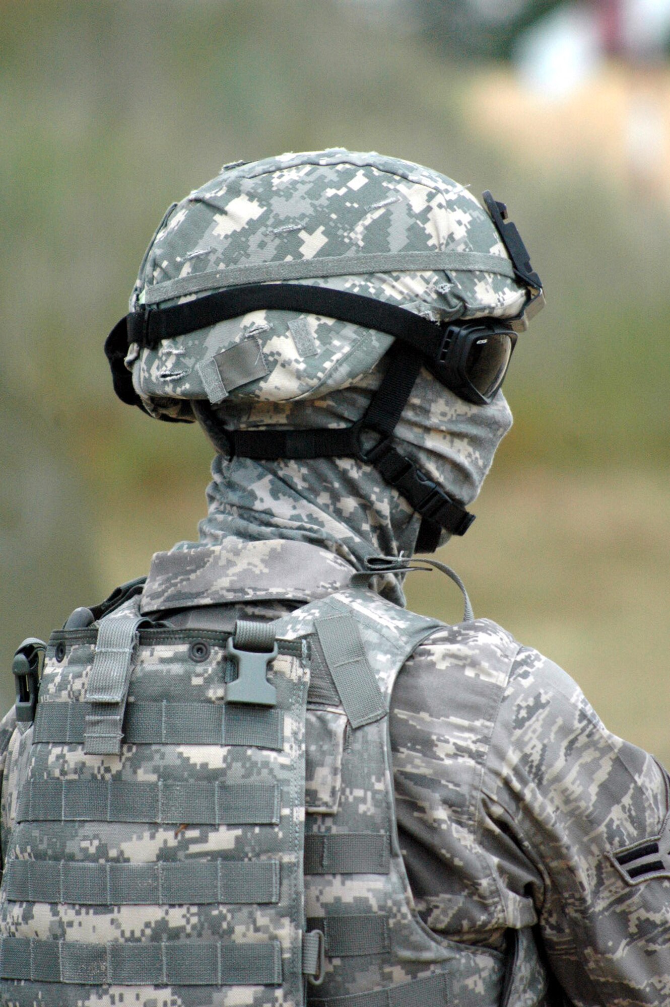 A student in the Air Force Phoenix Warrior Training Course is fully covered in digital camouflage during training on a Fort Dix, N.J., range June 20, 2008.  Phoenix Warrior is taught by the U.S. Air Force Expeditionary Center's Expeditionary Operations School and 421st Combat Training Squadron on Fort Dix, N.J.  (U.S. Air Force Photo/Tech. Sgt. Scott T. Sturkol)