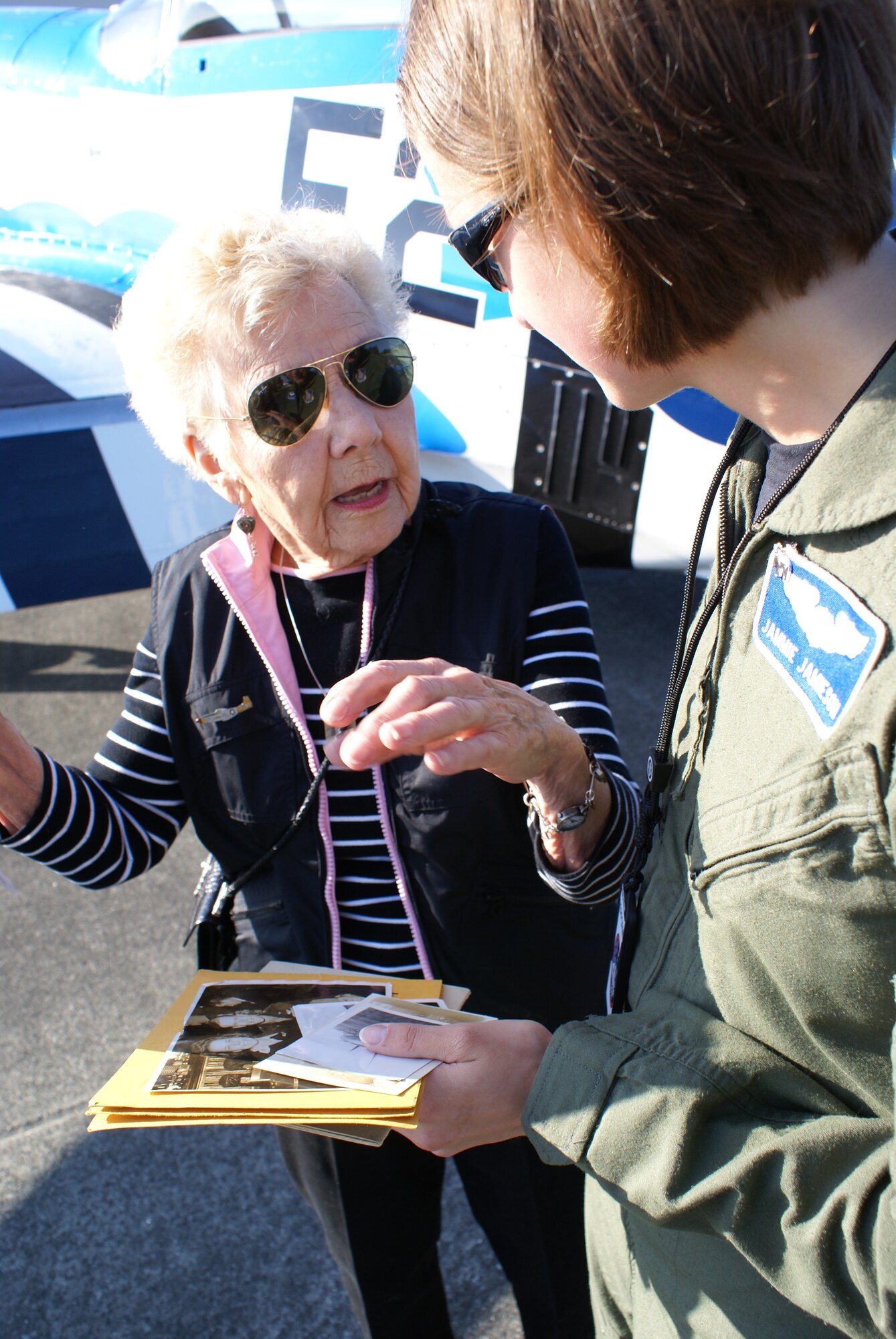 Dorothy Olsen, a former Women Airforce Service Pilot, meets with Capt. Jammie Jamieson, the first operational and combat-ready female pilot of the F-22 Raptor, here Sunday at the McChord Air Expo 2008. Captain Jamieson, currently stationed at Elmendorf Air Force Base, Alaska, is the mobility flight commander for the 525th Fighter Squadron. (U.S. Air Force photo/Staff Sgt. Oshawn Jefferson)