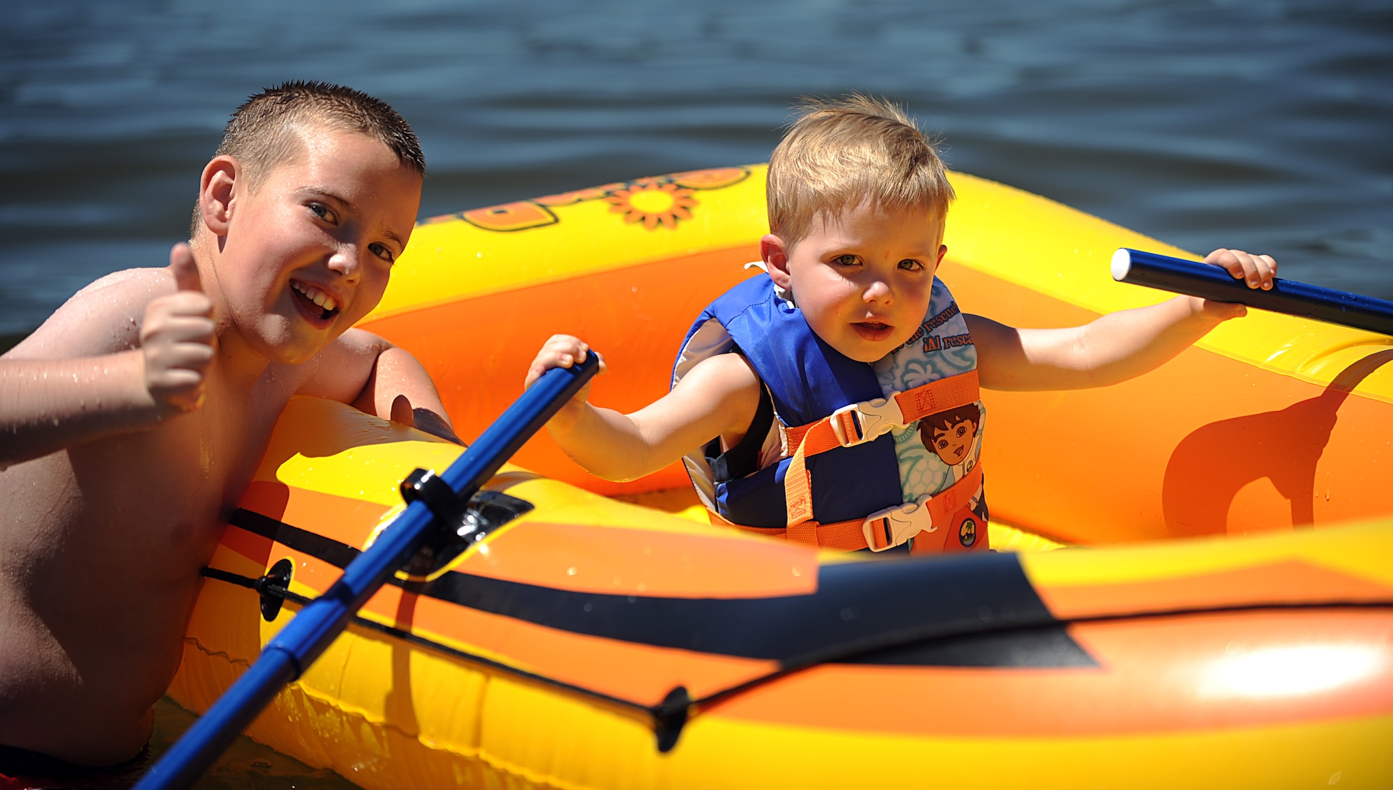 MOUNTAIN HOME AIR FORCE BASE, Idaho -- Families from Mountain Home Air Force Base take advantage of jet skis and other water activities offered at the private beach party hosted by Cascade community members on Lake Cascade during the Mountain Home Air Force Base marriage retreat July 12. While the chapel hosted the retreat, the entire Integrated Delivery System -- comprised of base agencies committed to helping active duty military members and their families, retirees and department of defense civilians -- provided support. These agencies include, but aren’t limited to, the Airmen and Family Readiness Center, family advocacy, health and wellness center and the chapel. (U.S. Air Force photo/ Airman 1st Class Ryan Crane)