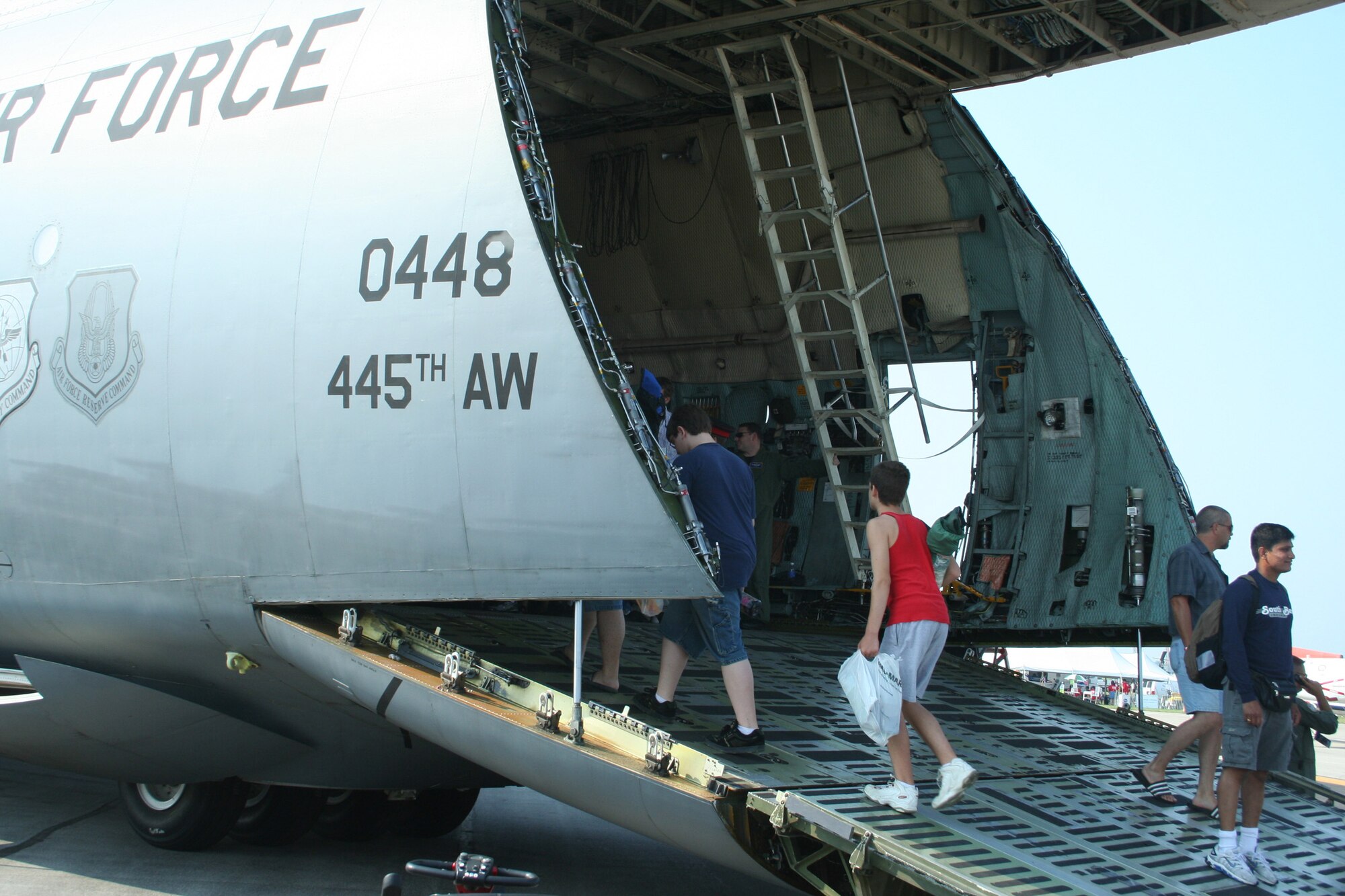 WRIGHT-PATTERSON AFB, Ohio - The 445th Airlift Wing's massive C-5 was the center of attention at the Dayton Airshow. The C-5 is the largest aircraft in the Air Force inventory and is always a crowd pleaser as people can enter at the nose and walk through the aircraft and exit at the tail. In addition to the C-5 static display, the 445th Airlift Wing provided a C-5 flyover on Sunday, July 20, 2008.  (U.S. Air Force photo/Senior Airman Ken LaRock)