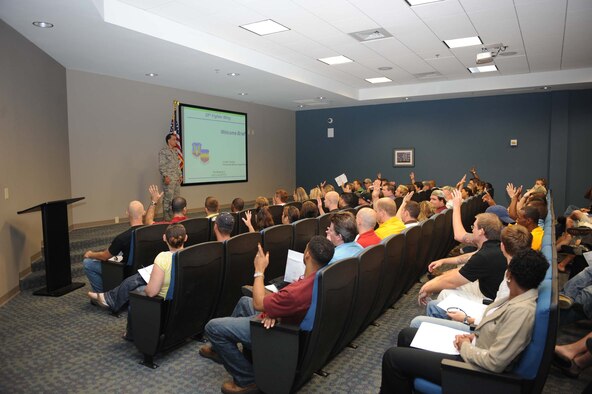SHAW AIR FORCE BASE, S.C. -- Col. Ted Uchida, 20th Mission Support Group commander, briefs members of the Inactive Ready Reserve during the IRR Muster July 19. An IRR Muster is a medical screening for all former active duty members now on IRR status and also provides them with a chance to talk with an Air Force Reserve recruiter and get a military ID card if necessary. (U.S. Air Force Photo/Staff Sgt. Henry Hoegen)