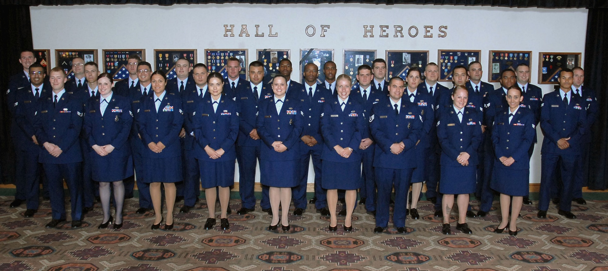 CANNON AIR FORCE BASE, N.M. --  Airman who graduated from Airman Leadership School, Class 2008-F, July 10, stand in front of the Hall of Heroes at The Landing. (U.S. Air Force photo by Airman 1st Class Danielle Martin)
