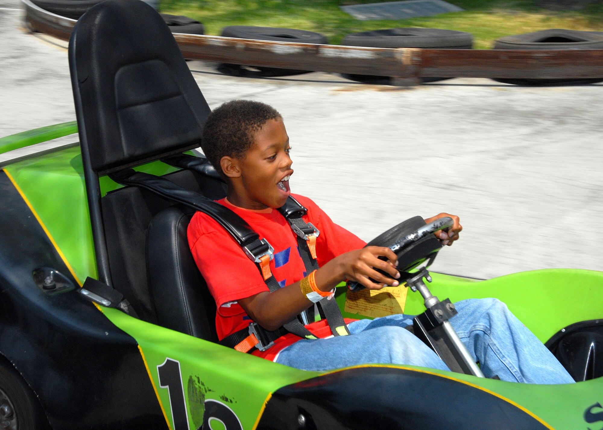 Jacob Milton is having a blast on the Speedway Go-Karts course at Mulligan Family Fun Center in Carson, Calif. Children participating in the Los Angeles Air Force Base Youth Center Summer Camp 2008 visit different locations geared to enhance their mental and physical fitness. Next stop is the Science Center in Santa Anna, July 23. The fieldtrips take place every Wednesday through August 29.  Parents can sign up their children on a weekly basis to participate in the fieldtrips which include swimming on Tuesdays and Thursdays. For details, call the Youth Center at 310-653-8383. (Photo by Joseph Juarez)

