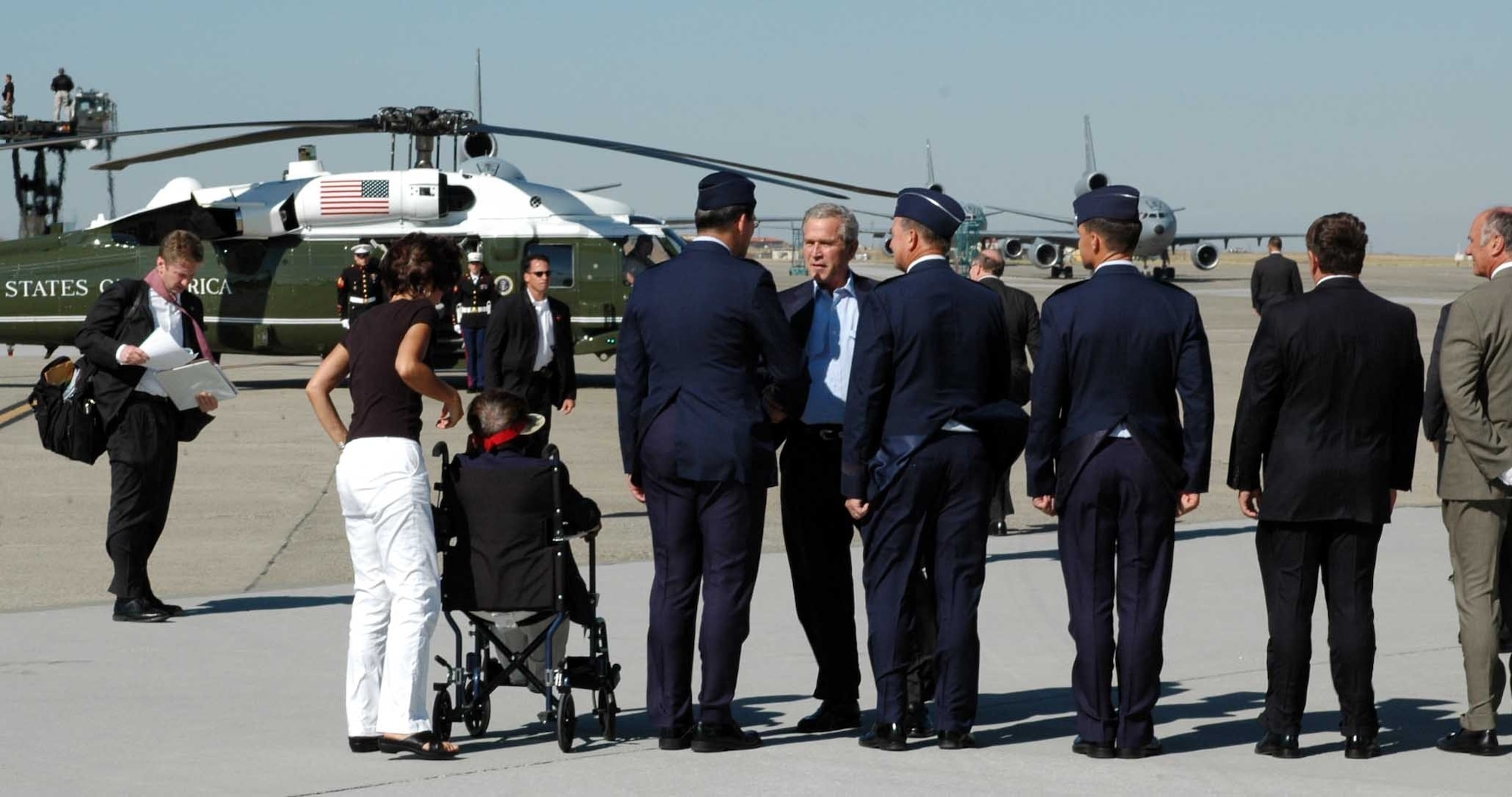 President George Bush is greeted by Travis leadership on the flightline July 18. (U.S. Air Force photo Airman 1st Class Kristen Rohrer)