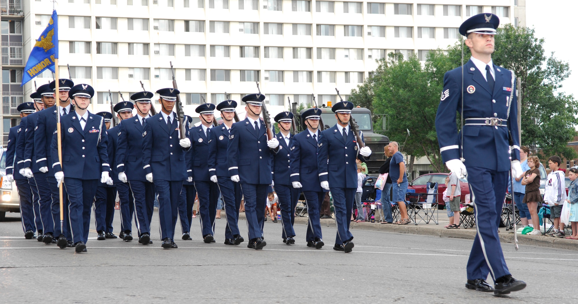 MINOT, N.D. – Members of the Minot Air Force Base Honor Guard march in unison during the North Dakota State Fair Parade here July 20. Both the 5th Bomb Wing and 91st Missile Wing were well represented during the parade. (U.S. Air Force photo by Staff Sgt. Thomas Dow)