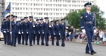 MINOT, N.D. – Members of the Minot Air Force Base Honor Guard march in unison during the North Dakota State Fair Parade here July 20. Both the 5th Bomb Wing and 91st Missile Wing were well represented during the parade. (U.S. Air Force photo by Staff Sgt. Thomas Dow)