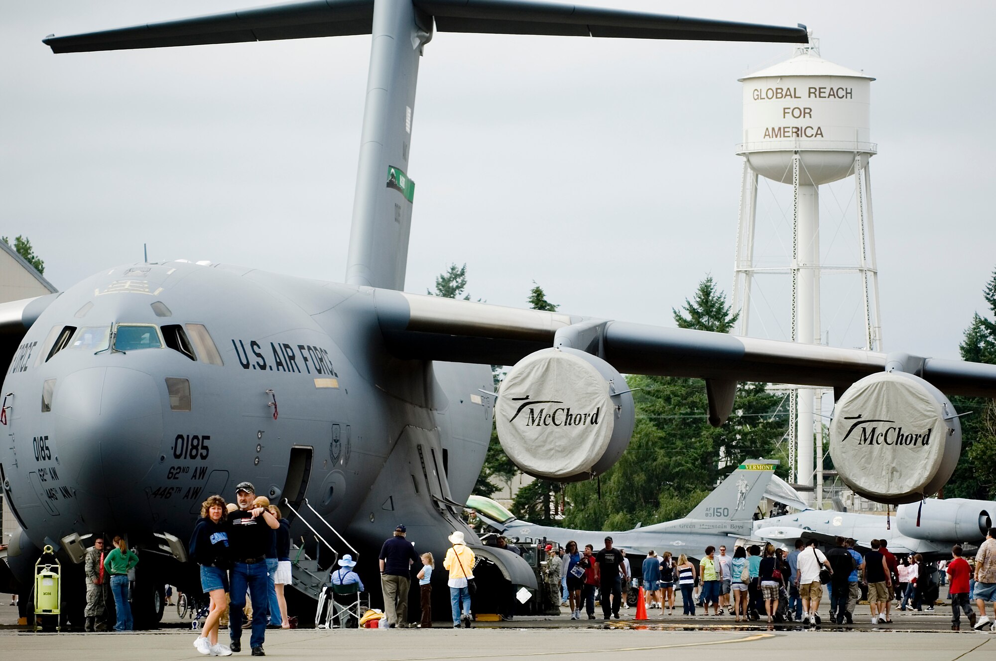 The McChord Air Expo 2008 crowd pours in around the C-17 Globemaster III on static display July 19 and 20. The two-day event drew 377,616 people allowing McChord to say “thank you” to the surrounding communities for the support they show the base every day.  This year’s theme, “Freedom, What it Takes!” allowed the community to get a glimpse of the pride, professionalism and capabilities of America’s finest. (U.S. Air Force photo/Abner Guzman)