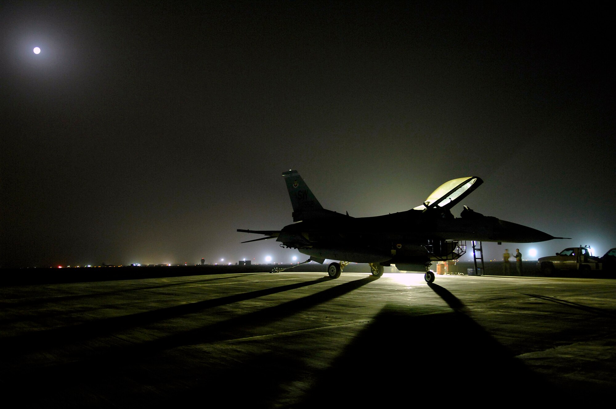 An F-16 Fighting Falcon sits on the flightline before an engine run up July 16 at Joint Base Balad, Iraq. The run up of the engine back and forth from full afterburner to idle allows the engine mechanics and crew chiefs to ensure all systems are fully functional before putting the fighter back into operational use. The F-16 is deployed from Shaw Air Force Base, S.C. (U.S. Air Force photo/Senior Airman Julianne Showalter) 
