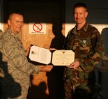 SEYMOUR JOHNSON AIR FORCE BASE, N.C. -- Tech. Sgt. Charles Alford (right) receives the Joint Services Commendation Medal from Lt. Col. James Horton during the July unit training assembly. Sgt. Alford, a computer maintenance apprentice with the 916th Communications Squadron has deployed to Honduras twice to support joint forces. Col. Horton is the 916th Communications Squadron commander.