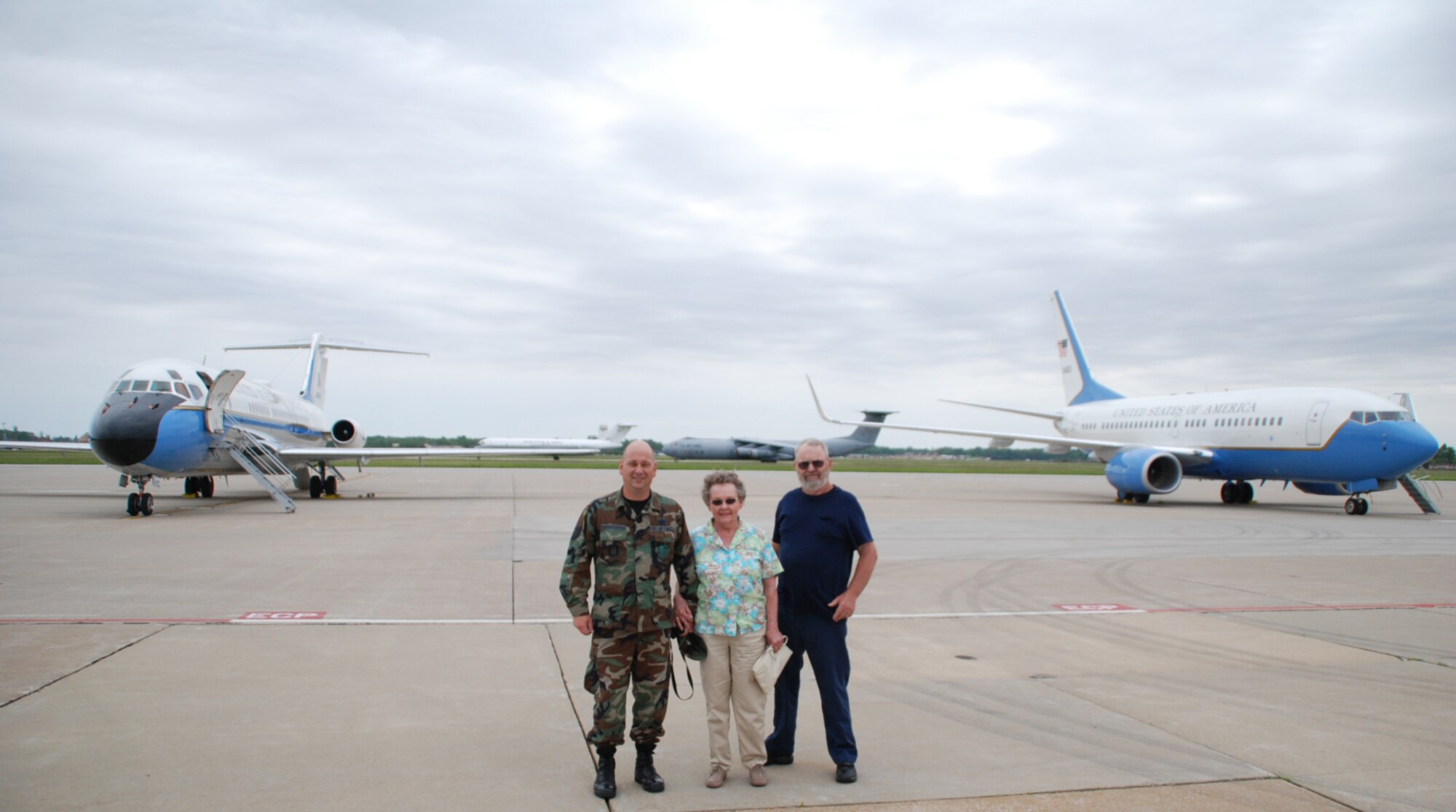 The C-9C and C-40C sit at the ready.  The mission of the 932nd Airlift Wing, Air Force Reserve, assigned as a tenant unit at Scott Air Force Base, Ill., is to provide first-class, worldwide, safe, and reliable airlift for distinguished visitors and their staffs.  It equips, trains, and organizes a ready force of citizen airmen to support and maintain all facets of air base operations involving infrastructure and security. The wing also provides worldwide medical services to the warfighter from the front line to Continental United States fixed medical treatment facilities.   A variety of jobs are found through the wing including maintenance, medical, aeromedical, pilots, civil engineers, and recruiters.  One team member who decided to reenlist for six more years is Tech. Sgt. Gerald Sonnenberg who is a photographer and writer for the wing paper.  Photo/Maj. Stan Paregien