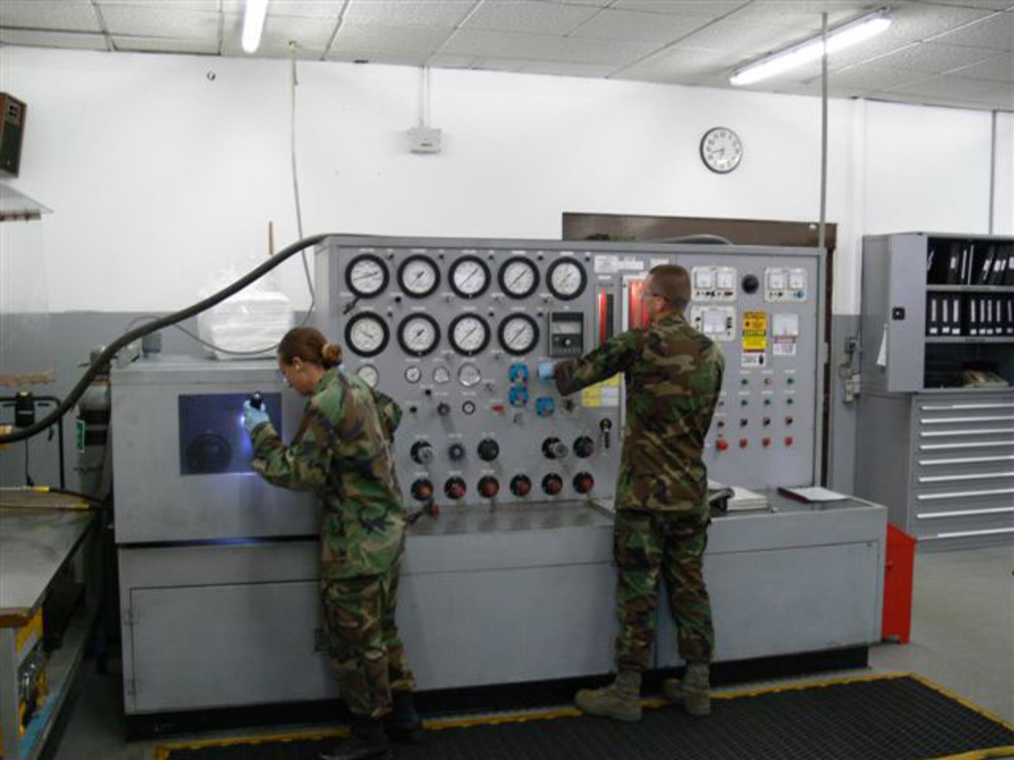 Staff Sgt. Kristy Rich and Airman 1st Class Briston Crowell, assigned to the 86th Maintenance Squadron Hydraulic Section, use the hydraulic test stand to conduct a pressure test on an aircraft hose with up to 3000 psi of pressure. (Courtesy Photo)

