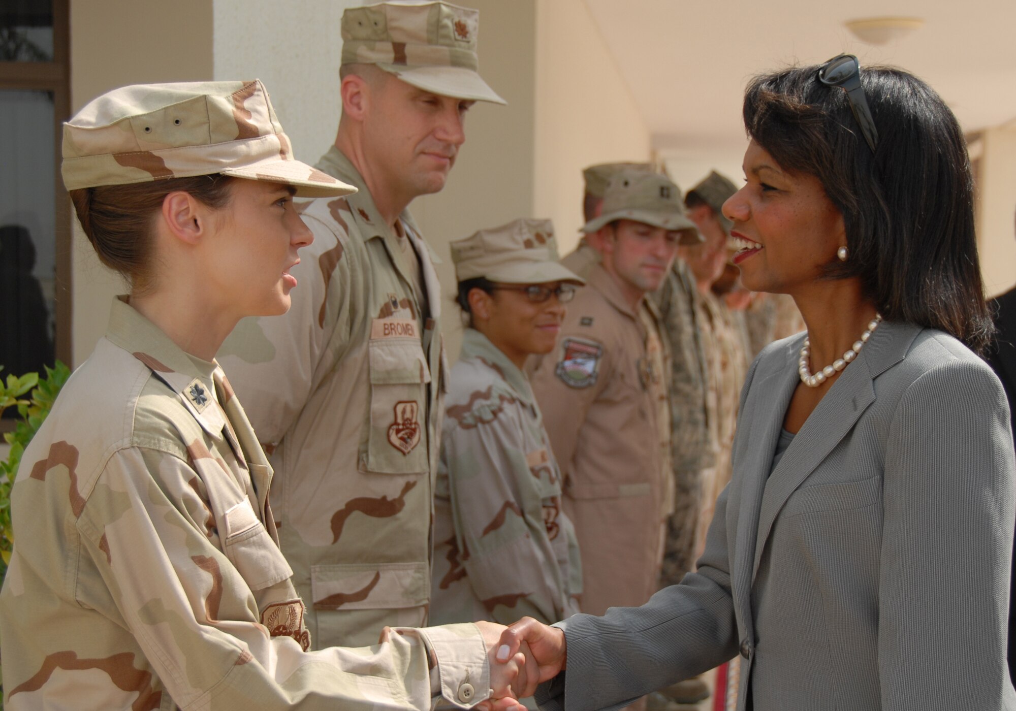 SOUTHWEST ASIA-- Lt. Col. Tanya Ruth Kubinec, 380th Air Expeditionary Wing Logistics Readiness Commander, greets Secretary of State Condoleezza Rice here before she departed enroute to Singapore.(U.S. Air Force photo/Tech. Sgt. Christopher A Campbell)