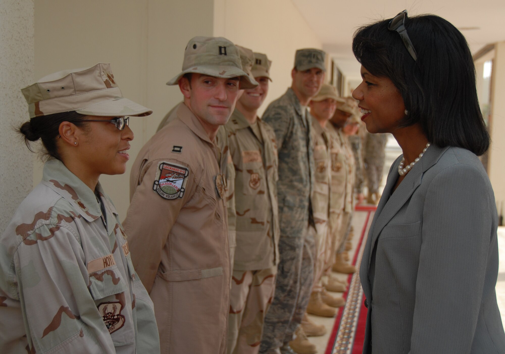 SOUTHWEST ASIA-- Maj. Joan Hoyte, 380th Air Expeditionary Wing Executive Officer, greets Secretary of State Condoleezza Rice here before she departed enroute to Singapore. Maj. Hoyte of Charleston, S.C., is deployed here from Nellis AFB, Nev.
(U.S. Air Force photo/Tech. Sgt. Christopher A Campbell)