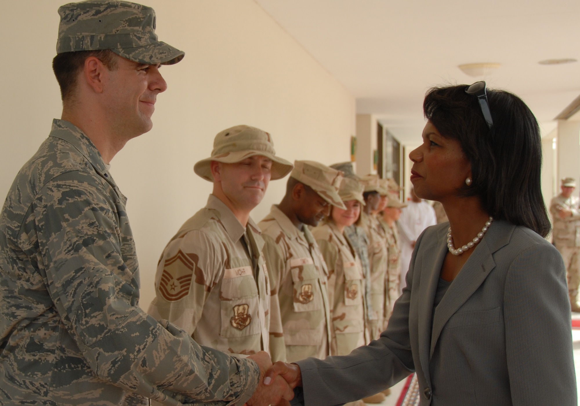SOUTHWEST ASIA--1st Lt. Michael Frye, Public Affairs Officer for the 380th Air Expeditionary Wing, greets Secretary of State Condoleezza Rice during her recent stop here. Lt. Frye is a member of the South Dakota Air National Guard deployed here in support of the Global War on Terror. (U.S. Air Force photo/Tech. Sgt. Christopher A Campbell)