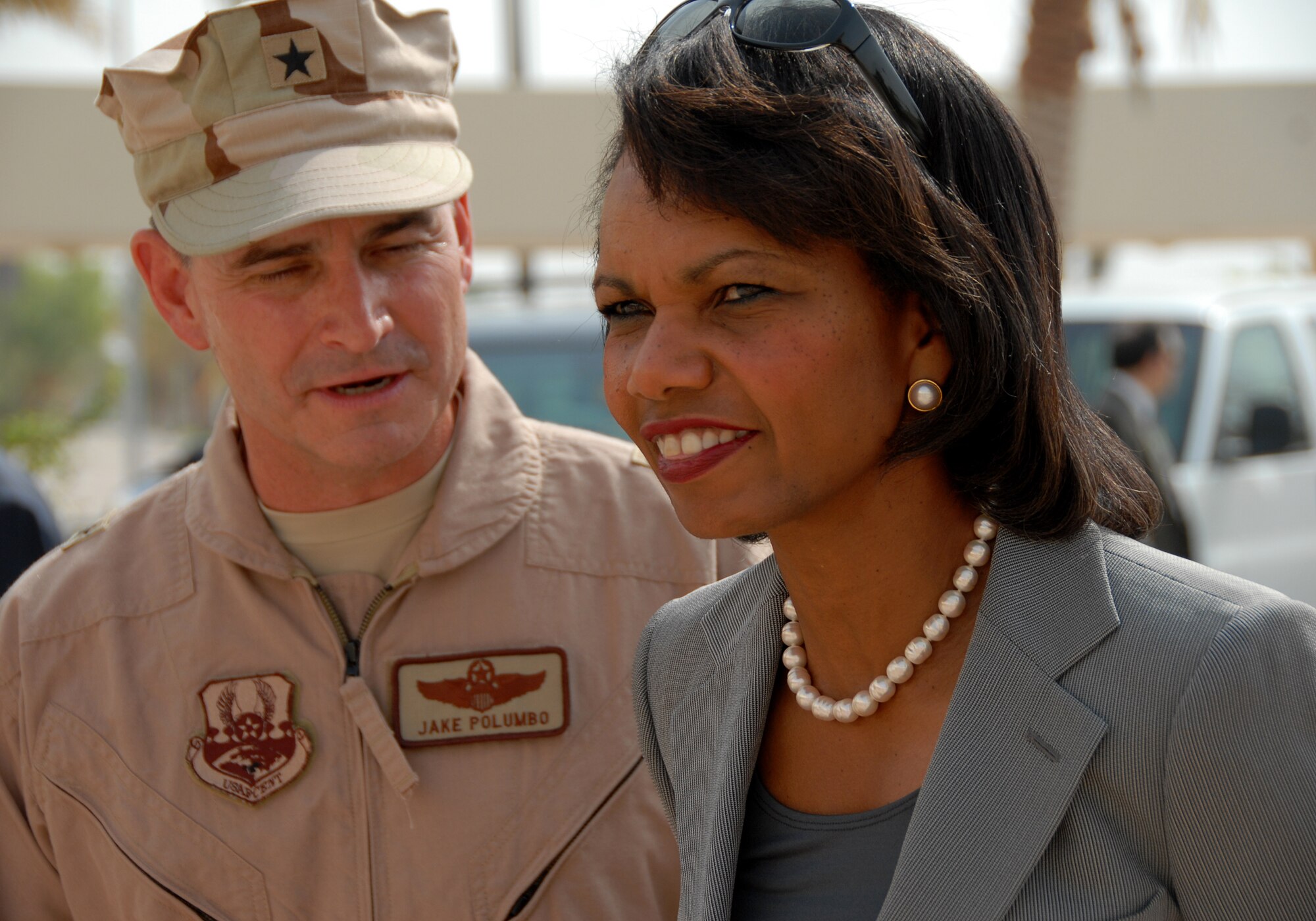 SOUTHWEST ASIA--Secretary of State Condoleezzaa Rice visits briefly with Brig. Gen. H. D. Polumbo Jr., 380th Air Expeditionary Wing Commander, here before leaving for Singapore. (U.S. Air Force photo/Tech. Sgt. Christopher A Campbell)