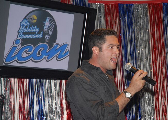 Senior Airman A. David Verde performs ?Bohemian Rhapsody? at the base-level competition for AMC Icon at the Charleston Club July 18. Airman Verde was chosen as the second place winner in AMC Icon and will advance to the command-level competition as the top-performing Airman. Airman Verde is an air transportation journeyman. (U.S. Air Force photo/Airman 1st Class Melissa White)