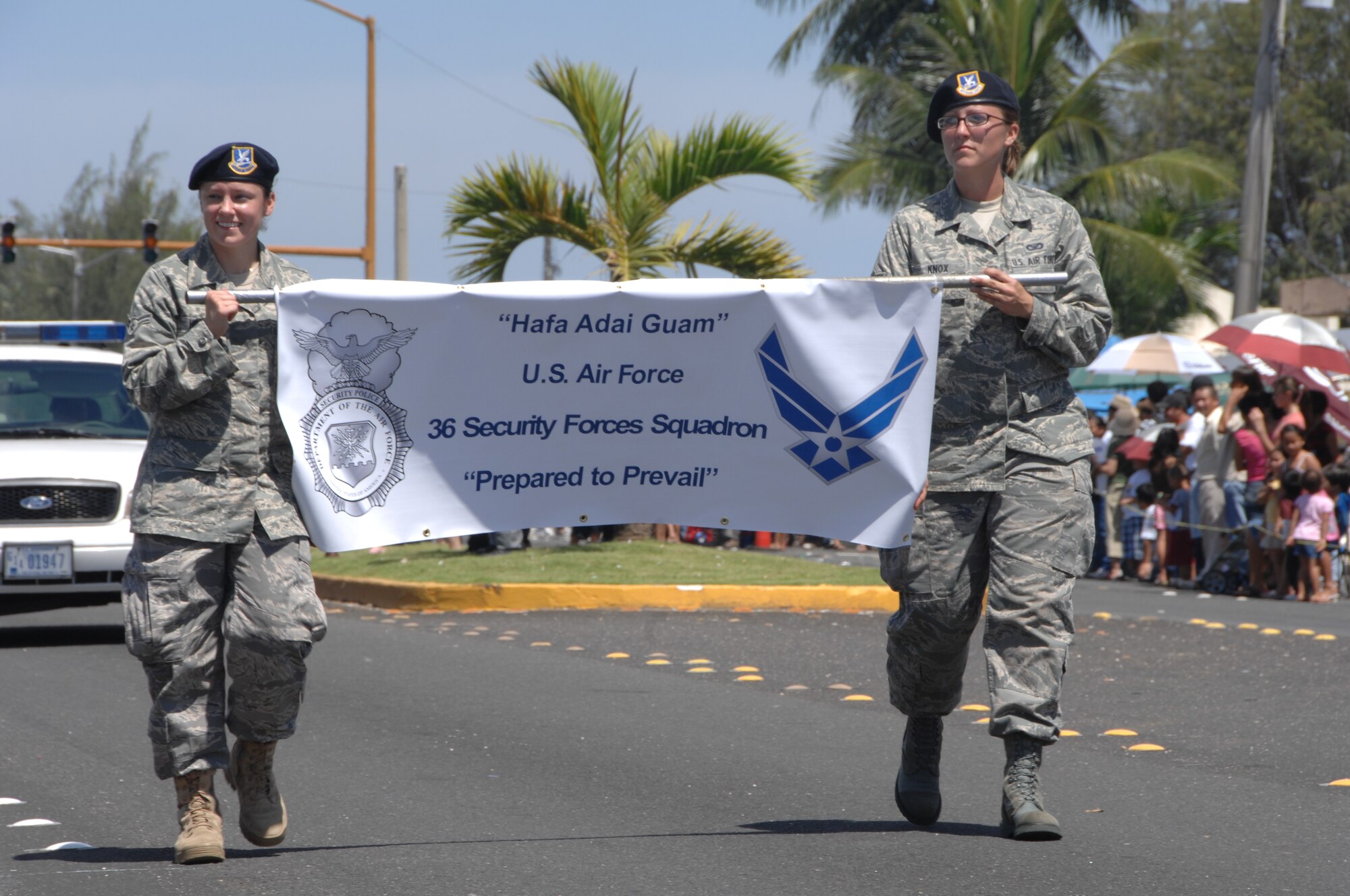 Members of the 36th Security Forces Squadron represent Andersen during the 64th Annual Guam Liberation Day Parade July 21. The theme for this yea’rs parade was Inafa'maolek: Inaguaiya Yan Kinenprende Para Tudu (Sharing: Love and Understanding for All). (U.S. Air Force photo by Airman 1st Class Courtney Witt)