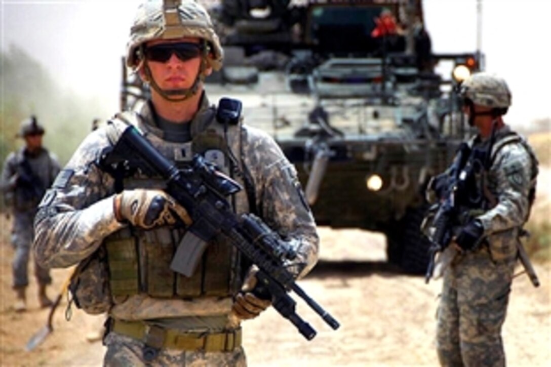 U.S. Army 1st Lt. Steven Robinson, conducts a dismounted patrol with his soldiers in Hor Al Bosh, Iraq, July 18, 2008. The soldiers are assigned to the 25th Infantry Division's 1st Battalion, 27th Infantry Regiment.  
