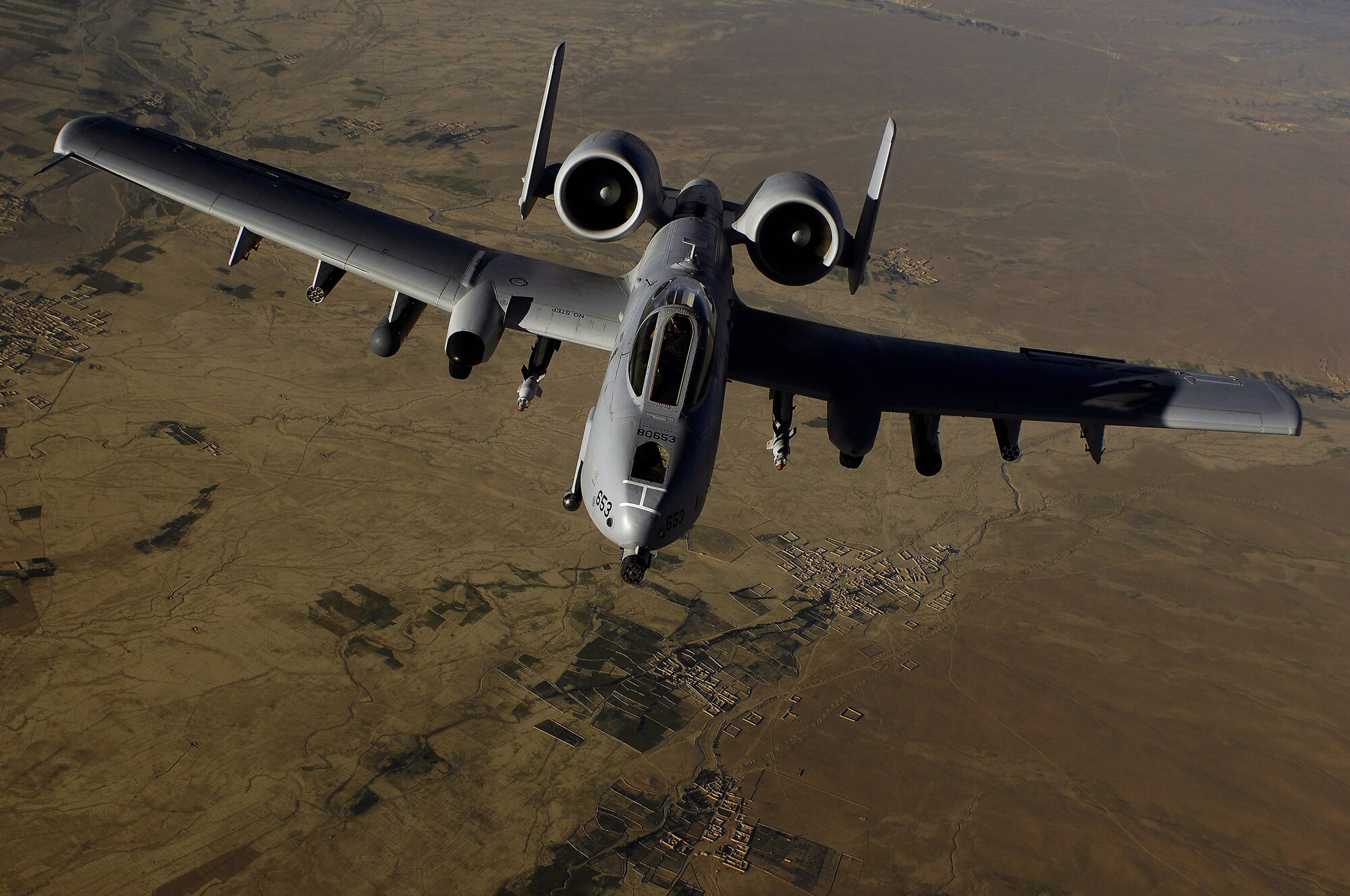 An A-10 Thunderbolt II aircraft moves into position to receive fuel from a KC-135 Stratotanker during a mission over Afghanistan.  A-10s are highly accurate weapons-delivery plateforms. (U.S. Air Force photo/Master Sgt. Andy Dunaway)
