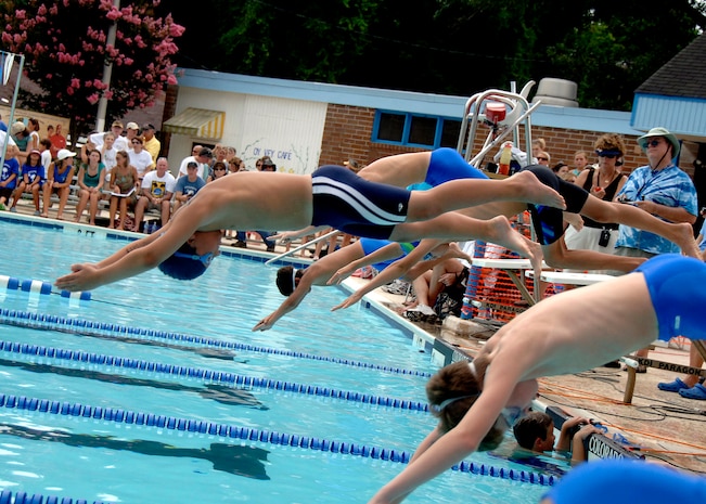 Boys age 9-10 dive into the pool for the freestyle event during the 2008 Coastal Carolina Aquatics Association swimming championship at the Jewish Community Center, Charleston, S.C., July 20. More than 100 children participated in the meet, to include Charleston AFB youths who were part of the Federal Armed Services Team.  (U.S. Air Force photo/Airman 1st Class Timothy Taylor)