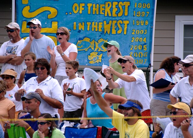 Friends and families cheer on swimmers during the 2008 Coastal Carolina Aquatics Association swimming championship at the Jewish Community Center, Charleston, S.C., July 20. Participants performed several strokes including free style, butterfly, back stroke, breast stroke and the individual medley. More than 100 children participated in the meet, to include Charleston AFB youths who were part of the Federal Armed Services Team. (U.S. Air Force photo/Airman 1st Class Timothy Taylor)