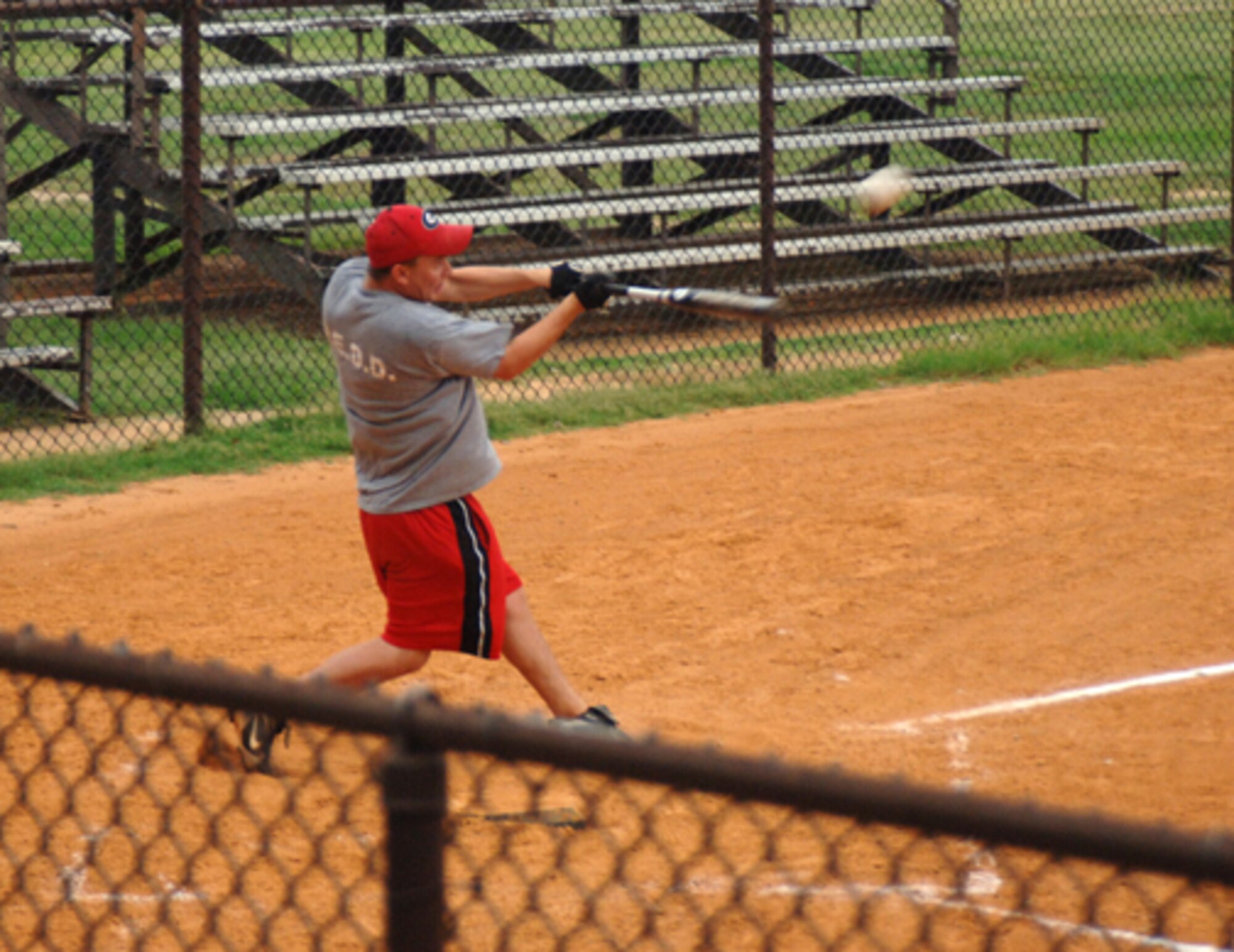 Robert Jones, 14th Civil Engineer Squadron, swings at a pitch during a softball game against the 41st and 37th Flying Training Squadrons Tuesday. The 41st FTS and 37th FTS defeated the 14th CES with a score of 8-7. (U.S. Air Force photo by Airman Josh Harbin)