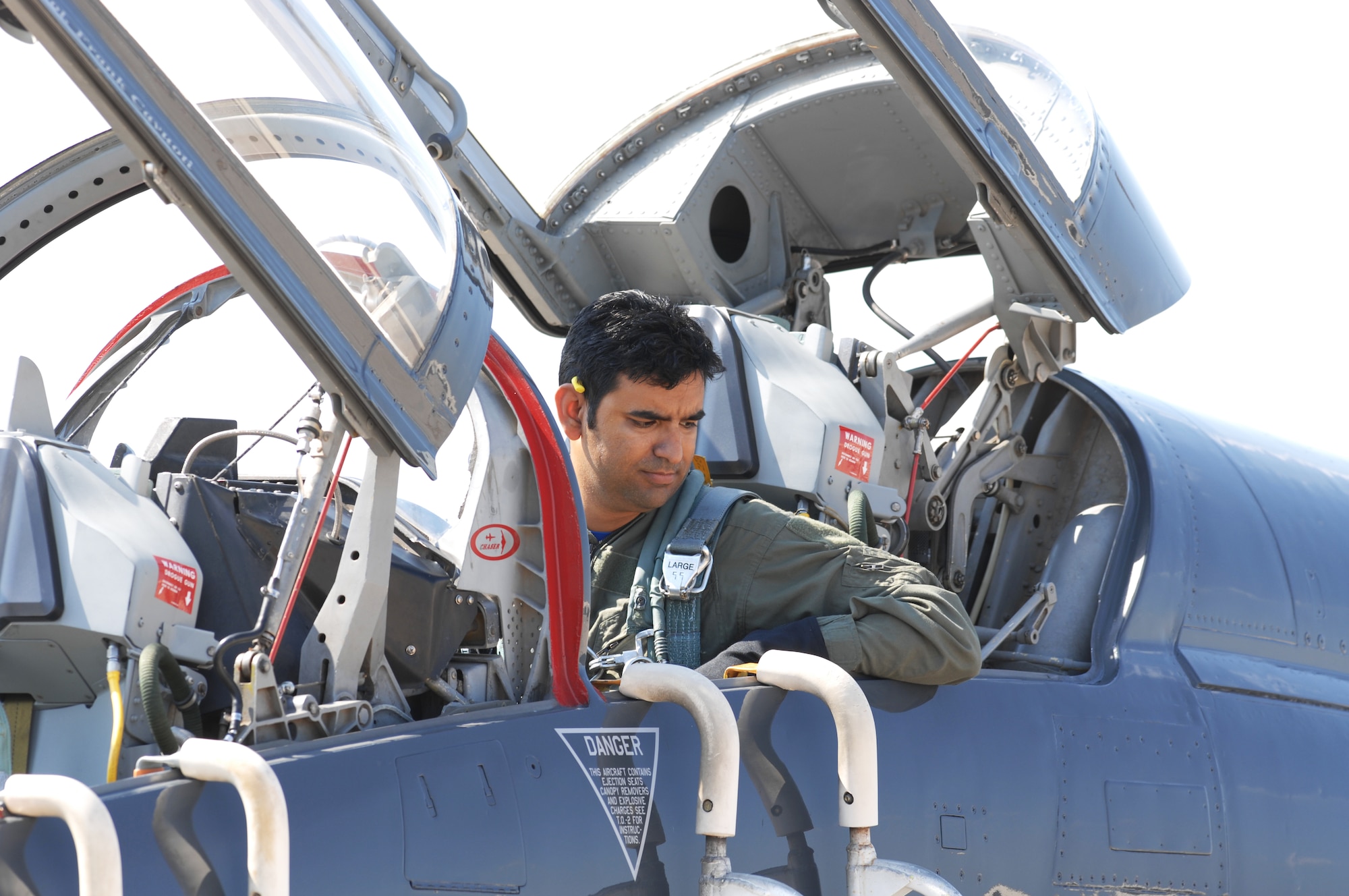 WHITEMAN AIR FORCE BASE, Mo. - Sagar Pathak, a journalist for World Airshow magazine and associate editor for In Flight magazine, sits in a T-38 Talon here following his B-2 chase flight July 18. Sagar visited Whiteman for five days and was introduced to several aspects of the B-2 world that he blogged about on his Web Site, www.horizontalrain.com. (U.S. Air Force photo/1st Lt. Matt Miller)