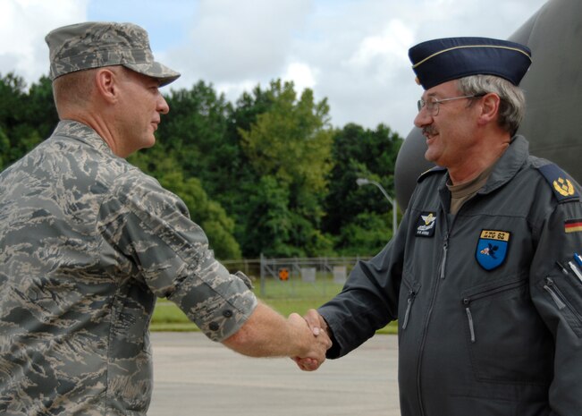 Col. John "Red" Millander greets German Generalmajor Ahrens Hans-Werner for his visit to Charleston AFB July 21.The German general visited Charleston AFB for an orientation of the C-17 and to gain greater knowledge of the capabilities of the aircraft.  Colonel Millander is the 437th Airlift Wing commander and General Hans-Werner is the commander of the German Air Force Air Transport Command. (U.S. Air Force photo/Airman 1st Class Katie Gieratz)