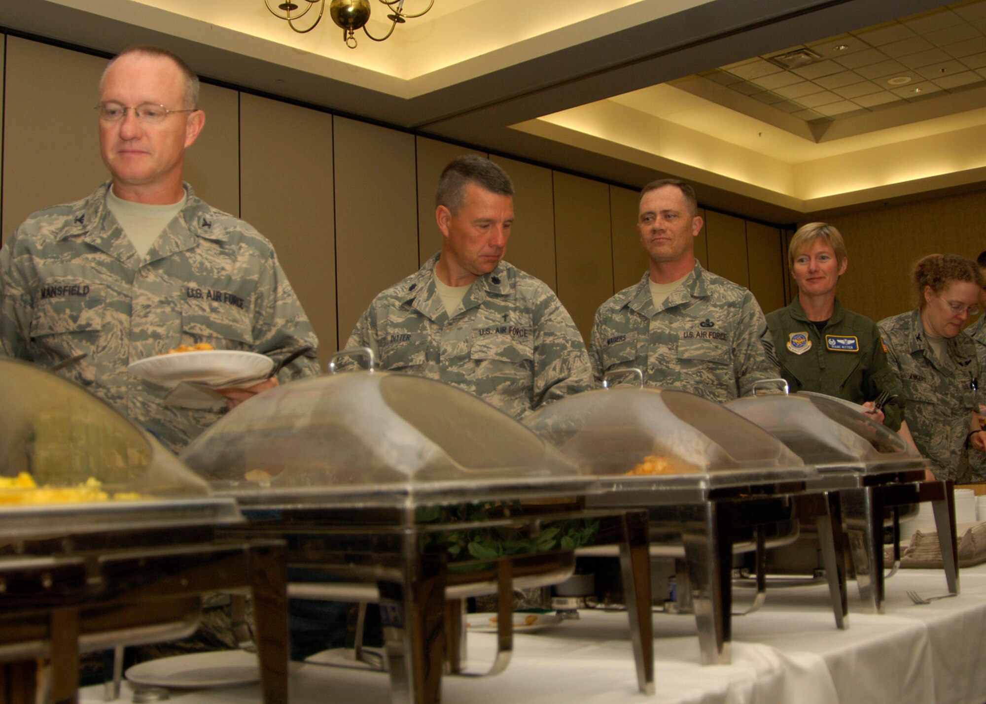 SCOTT AIR FORCE BASE, Ill. -- New and current 375th Services Club Card members enjoy a free breakfast at the Scott Club July 17th. The breakfast was held to reward current members for their membership and to encourage otherss to join. Members were able to choose from eggs, sausage, biscuits, potatoes, and a breakfast burrito or omelet with their choice of fillings. 
(US Air Force photo/Airman 1st Class Wesley Farnsworth)