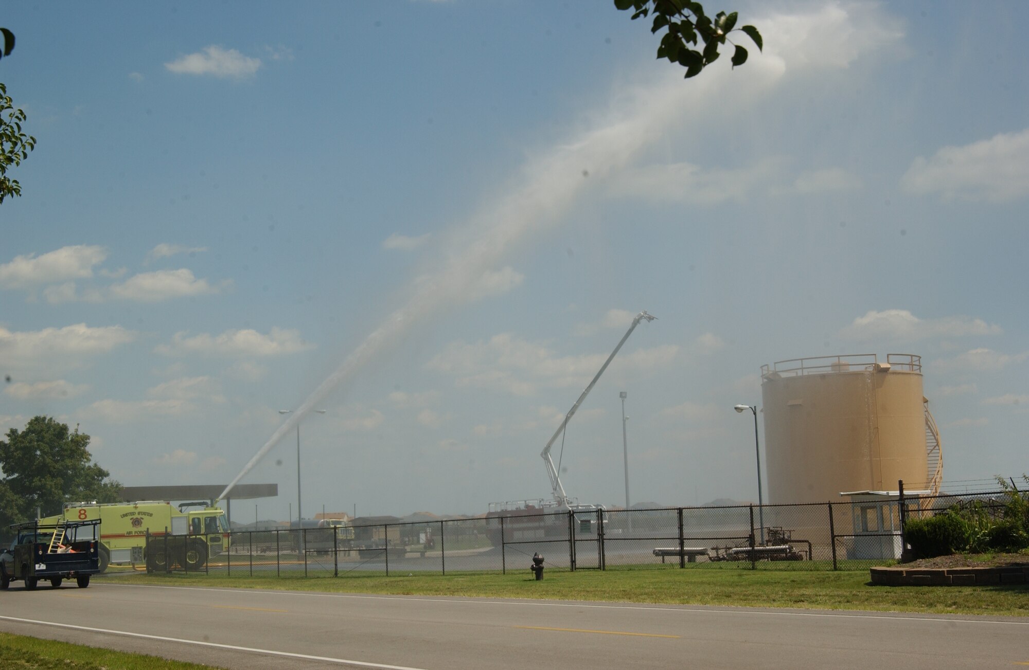 SCOTT AIR FORCE BASE, Ill. -- Firefighters from the 375th Civil Engineer Squadron fire emergency services flight conducted a building familiarization exercise last week at the 375th Airlift Wing fuels storage facility. As part of the exercise, firefighters are briefed on shutdown procedures and how to go about fighting a fire at that location. Due to the size of the facility and the highly flammable materials, the use of the aircraft crash trucks was deemed necessary. The firefighters also took the opportunity to test the reach of their equipment and how close or far away they needed to be to conduct safe operations. The fire emergency services flight conducts similar building familiarization drills at buildings all over Scott on a monthly basis.
photo/Monte Miller