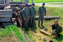 MINOT AIR FORCE BASE, N.D. – Senior Master Sgt. Joseph Hrezo, 5th Civil Engineer Squadron Explosive Ordinance Disposal superintendant, discusses the dangers Improvised Explosive Devices can have on vehicle convoys during the AFA cadets’ training session here July 10. The training was part of their ongoing Operation Air Force Third Lieutenant course. (U.S. Air Force photo by Airman 1st Class Benjamin Stratton)
