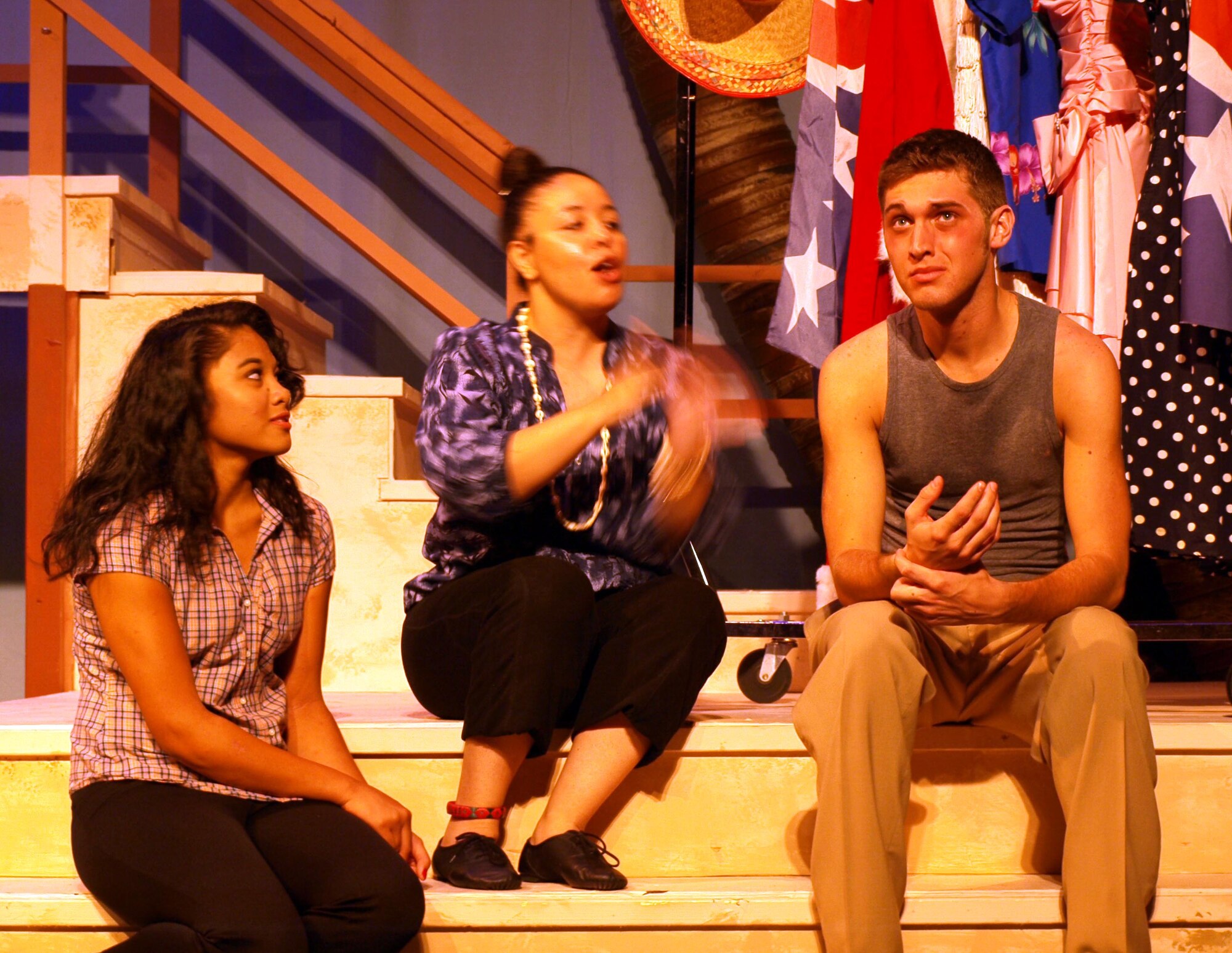 Pamelyne Guillory, center, and Joe Redman, right, are Team Vance members participating in “South Pacific,” a musical presented by the Gaslight Theatre in Enid. Ms. Guillory, playing the role of Bloody Mary, is the wife of Master Sgt. Jefferson D. Guillory III, the 71st Logistics Readiness Squadron superintendent. Mr. Redman, portraying Navy Lt. Joe Cable, is the son of Kate Holdeman, the Youth Programs coordinator at Vance. Mary DeGuzman, left, a local actress, plays the part of Liat. (Courtesy photo)