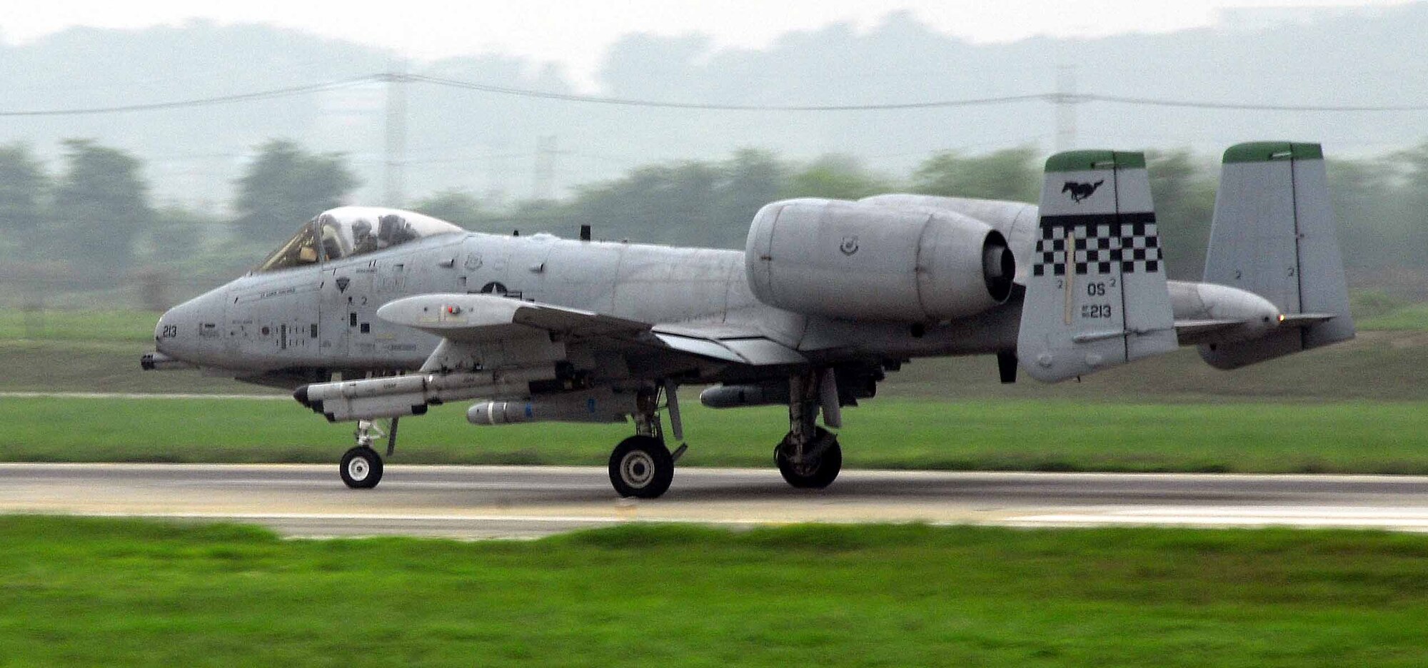 OSAN AIR BASE, Republic of Korea -- An A-10 Thunderbolt II from the 25th Fighter Squadron throttles down the runway during a base-wide exercise here July 23. (U.S. Air Force photo/Senior Airman Christopher Boitz)