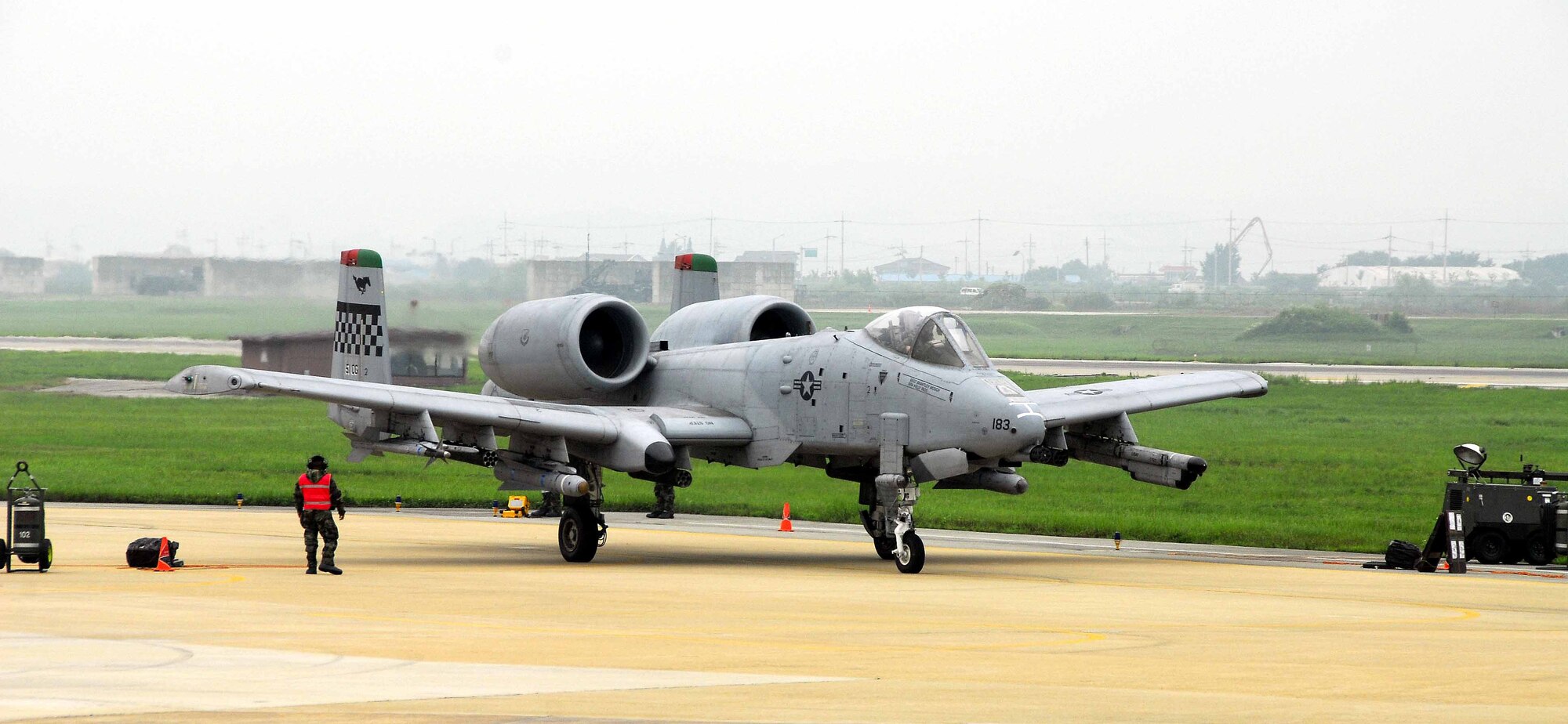 OSAN AIR BASE, Republic of Korea -- An A-10 Thunderbolt II assigned to the 25th Fighter Squadron, gets its final inspection before departing for a mission during the Beverly Bulldog 08-03 exercise July 23. The week-long operational readiness exercise tests Team Osan's ability to execute combat operations, receive follow-on forces and defend the base from attack. (U.S. Air Force photo/Senior Airman Christopher Boitz)