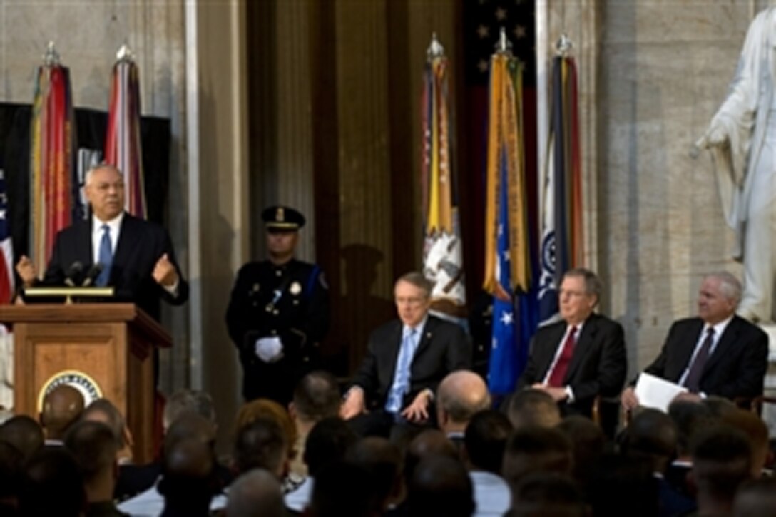 Retired Army Gen. Colin Powell, former chairman of the Joint Chiefs of Staff, speaks during a commemoration of the 60th anniversary of the integration of the armed forces in the Capitol Rotunda, Washington, D.C., July 23, 2008. Defense Secretary Robert M. Gates, far right, also spoke at the event, which celebrated 60 years of a racially integrated military following President Harry S. Truman's proclamation on July 26, 1948.
