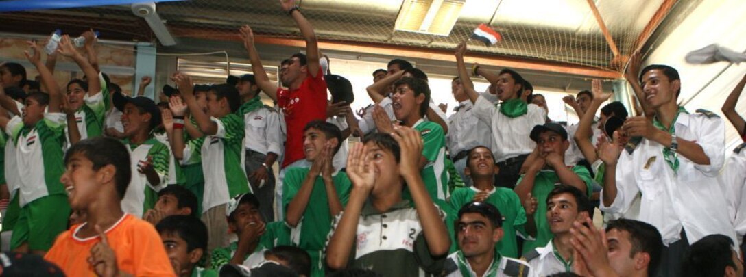 RAMADI, Iraq (July 23, 2008) - Children from various districts in Ramadi celebrate their soccer team's victory at the Ramadi Youth Conference July 23. The city’s officials, making the most of peace and tranquility, are planning several more conferences in the upcoming weeks and months. The city has scheduled a medical conference, leadership summit, and several soccer tournaments in the near future. (Official U.S. Marine Corps photo by Lance Cpl. Casey Jones) (RELEASED)