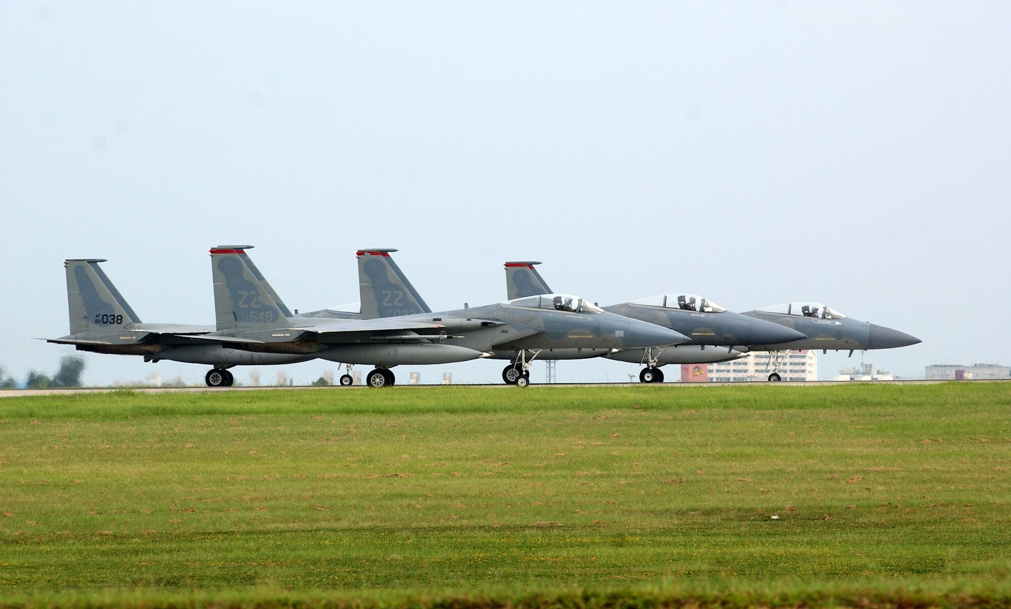 F15C Eagles from the 67th Fighter Squadron prepare for takeoff July 23 for a one-week exercise in Misawa Air Base, Japan.  (U.S. Air Force photo/Tech. Sgt. Rey Ramon) 