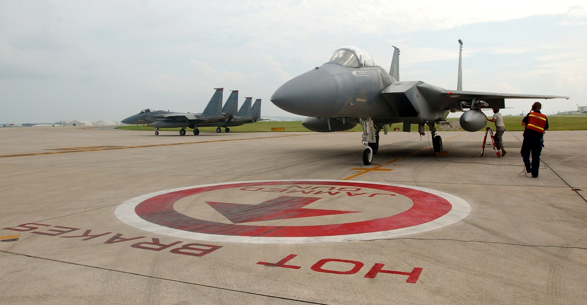 Airmen from the 67th Aircraft Maintenance Unit perform end of runway procedures for weapon systems on an F-15C Eagle before takeoff July 23, Kadena Air Base, Japan.  (U.S. Air Force photo/Tech. Sgt. Rey Ramon)