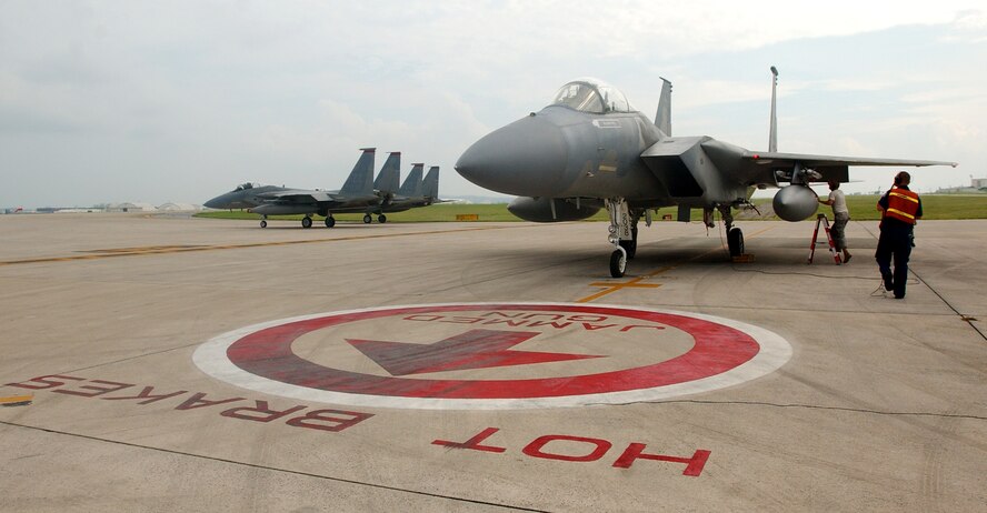 Airmen from the 67th Aircraft Maintenance Unit perform end of runway procedures for weapon systems on an F-15C Eagle before takeoff July 23, Kadena Air Base, Japan.  (U.S. Air Force photo/Tech. Sgt. Rey Ramon)