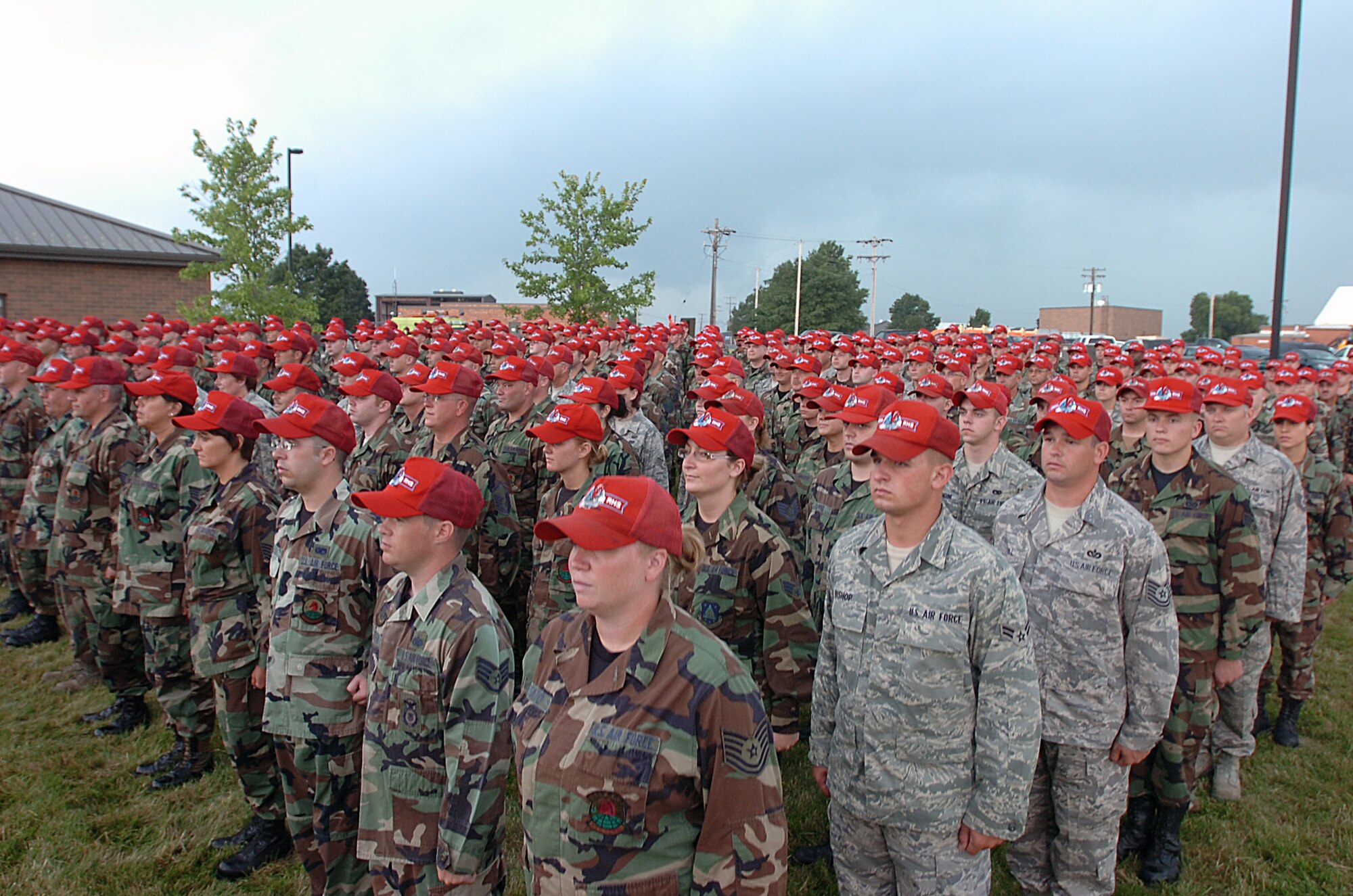 Airmen from the Ohio Air National Guard's 200th RED HORSE squadron stand in formation during a flagging ceremony July 20, 2008, at Mansfield Air Guard Base, Ohio. The Air Guard's civil engineer squadrons manned by hundreds of construction and repair experts will involuntary deploy overseas in historic numbers and scope during the next 24 months. (Photo by Master Sgt. Mike R. Smith, National Guard Bureau) (Released)   