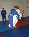 7/23/2008 - Gary Cain, 59th Medical Operations Squadron, takes down Paul Wachtler, 67th Network Warfare Wing, during Judo class. (USAF photo by Alan Boedeker)                               