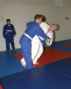 7/23/2008 - Gary Cain, 59th Medical Operations Squadron, takes down Paul Wachtler, 67th Network Warfare Wing, during Judo class. (USAF photo by Alan Boedeker)                               