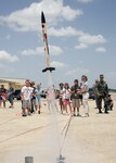 7/18/2008 - A rocket launches successfully July 18 during the Starbase Kelly academy. The academy includes aircraft tours, scientific experiments, rocket building and launching, computer flight simulation and teamwork and goal-setting exercises. (USAF photo by Robbin Cresswell)