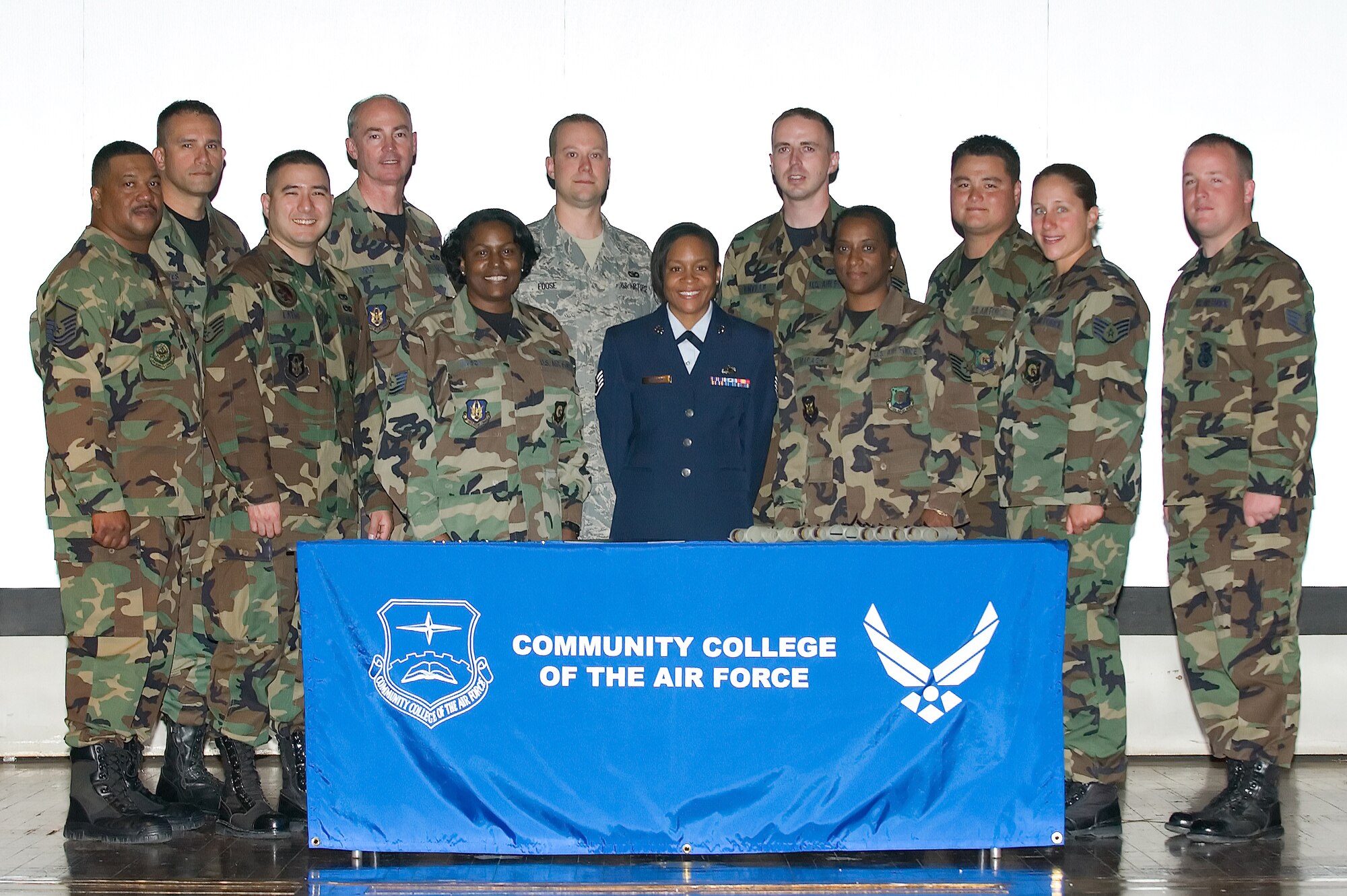 The Community College of the Air Force recently received new Dover alumni into its ranks. Twelve 512th Airlift Wing reservists received their associate degrees in a commencement ceremony Jun. 22 at the base theater. The Liberty Wing?s overall spring graduating CCAF class consisted of 23 members. (U.S. Air Force photo/Jason Minto) 
