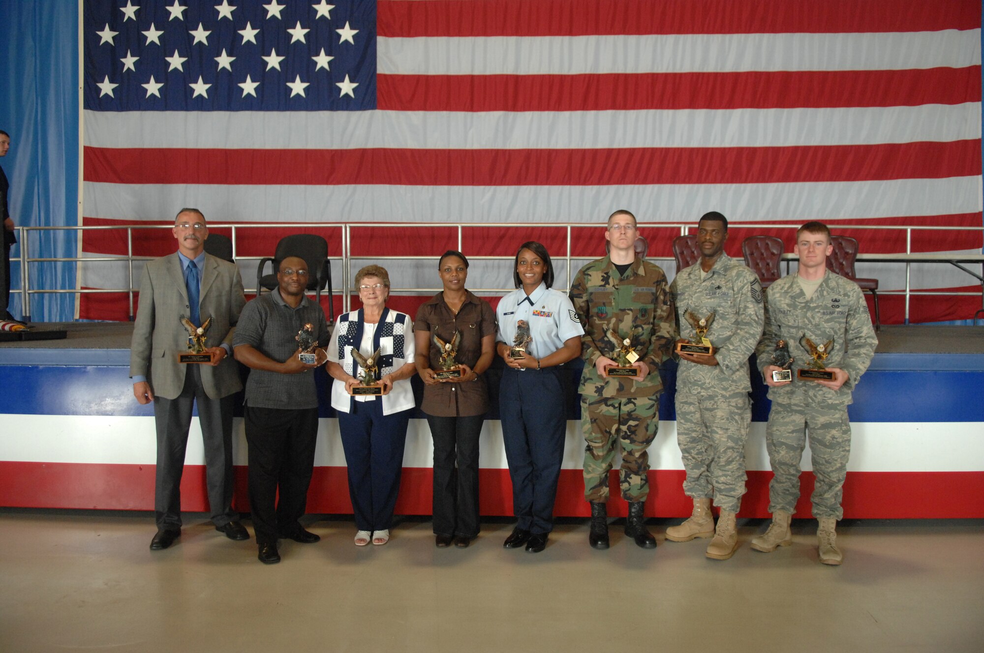 SHAW AIR FORCE BASE, S.C. -- Team Shaws quarterly award winners pose for a photo after a ceremony recognizing them as some of our most deserving individuals July 23. The winners will continue on to compete for Team Shaws annual award level. (U.S. Air Force photo/Staff Sgt. Nathan Bevier)