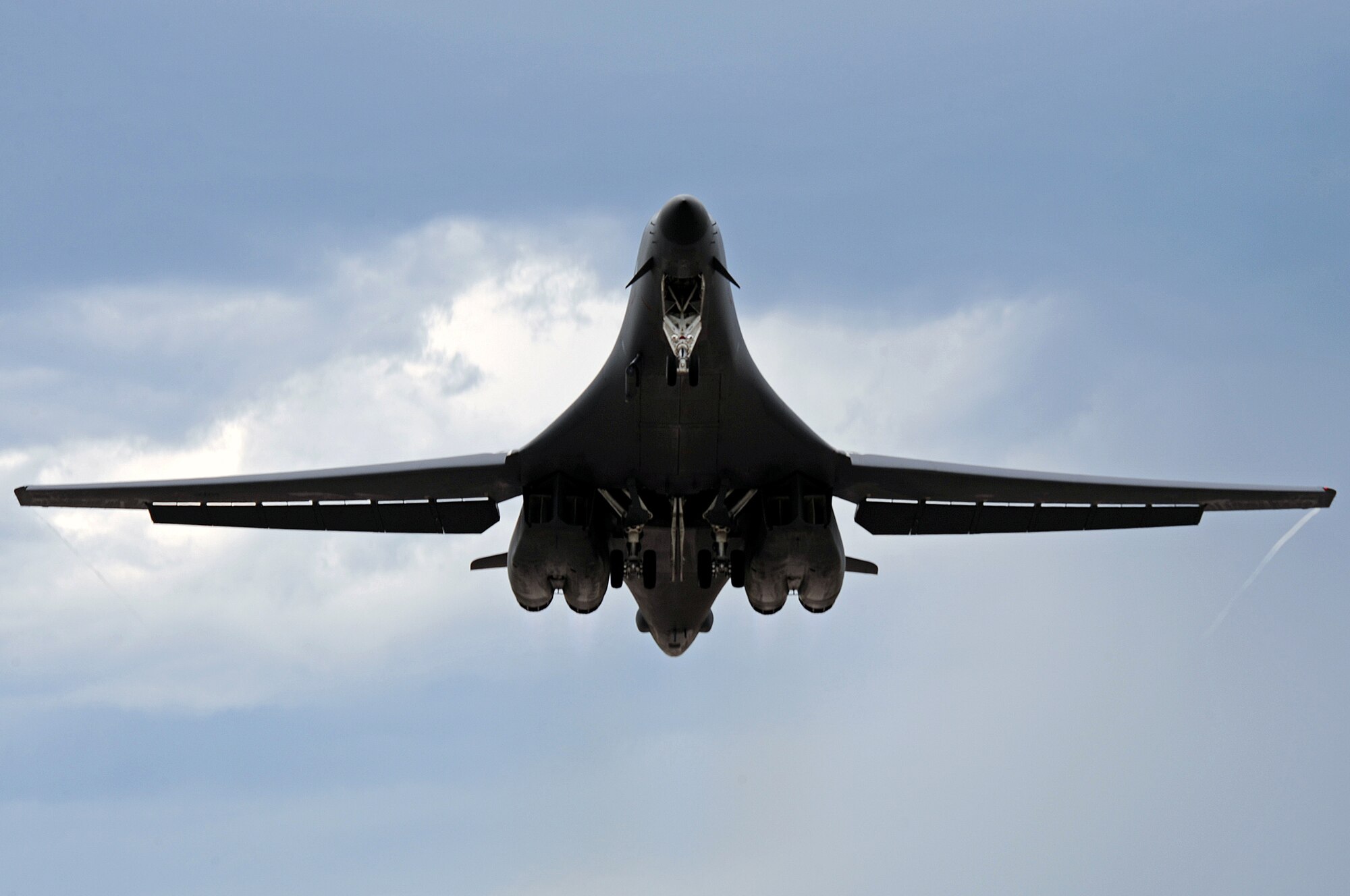 A 34th Bomb Squadron B-1B Lancer equipped with a Sniper Advanced Targeting Pod takes off on July 24. The B-1 is traveling to a forward operating location in Southwest Asia to support the Air Force mission with critical long-range strike capabilities. (U.S. Air Force photo/Senior Airman Marc I. Lane)