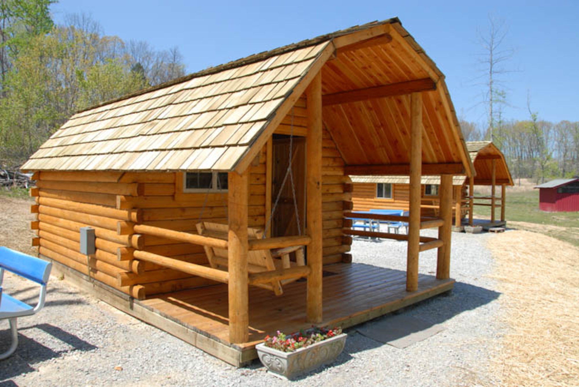 In the foreground is one of the single-room cabins at Arnold Air Force Base's Crockett Cove, with a double bed and a bunk bed – enough room to sleep four people. A two-room unit is visible to the right (rear), which will sleep six. (Photo by David Housch)