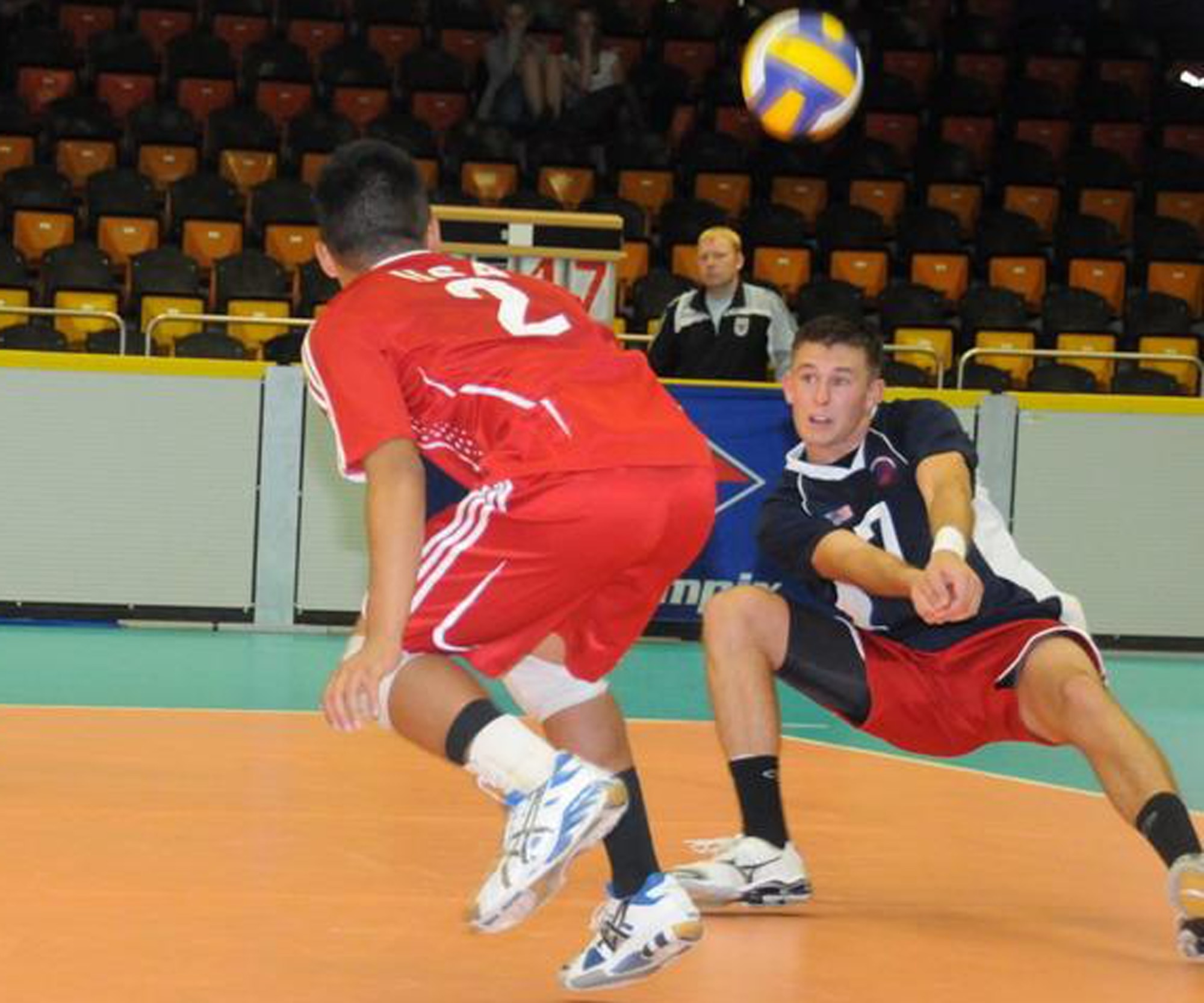 Airman 1st Class Thomas Read (blue shirt), 1st Special Operations Dental Squadron, played in the 29th World Military Volleyball Championships in Germany recently. He was one of only two Airmen selected to represent the United States on the All Armed Forces volleyball team. (Courtesy photo)